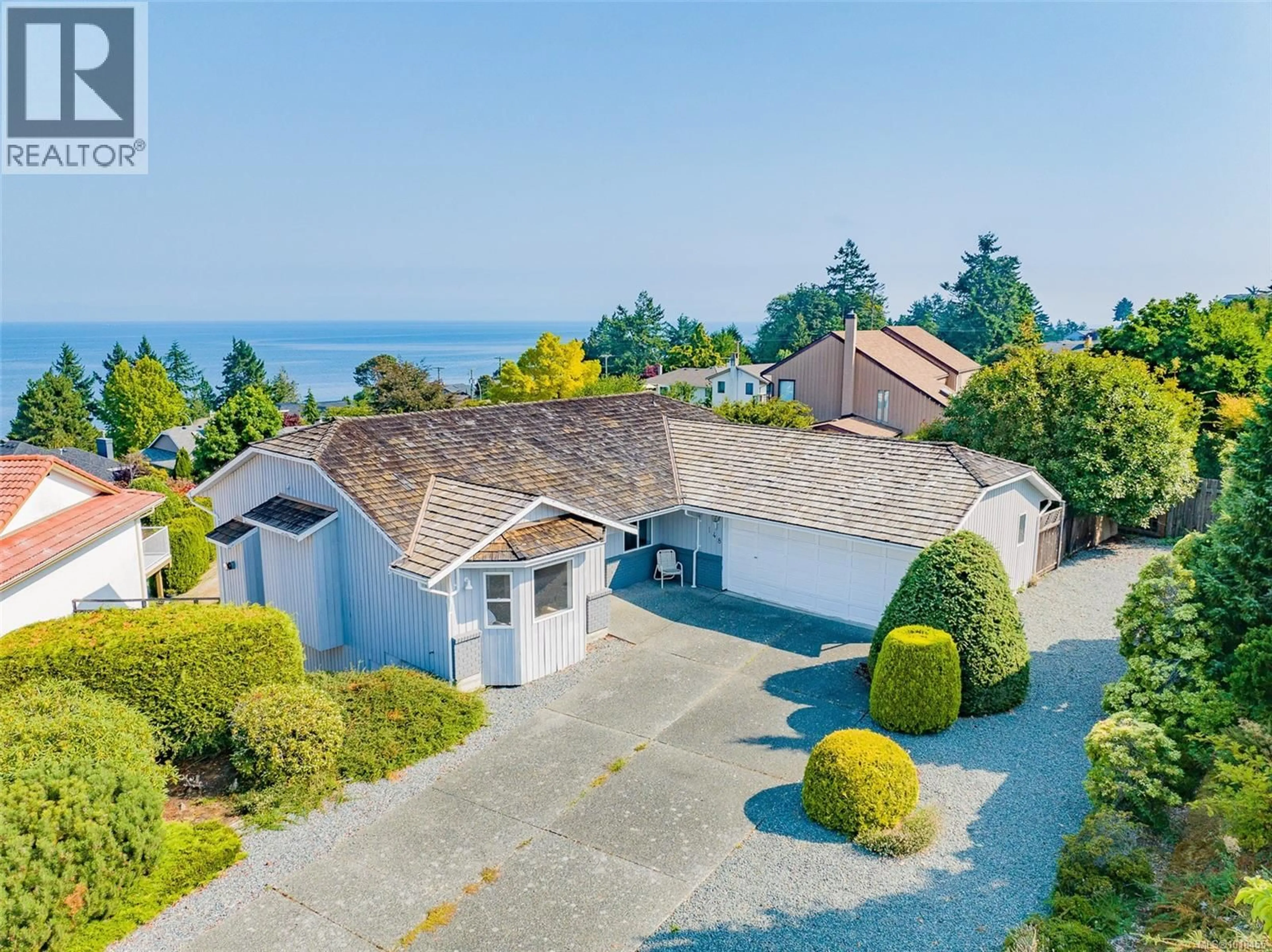 A pic from outside/outdoor area/front of a property/back of a property/a pic from drone, water/lake/river/ocean view for 148 SAND PIPER PLACE, Nanaimo British Columbia V9V1H5