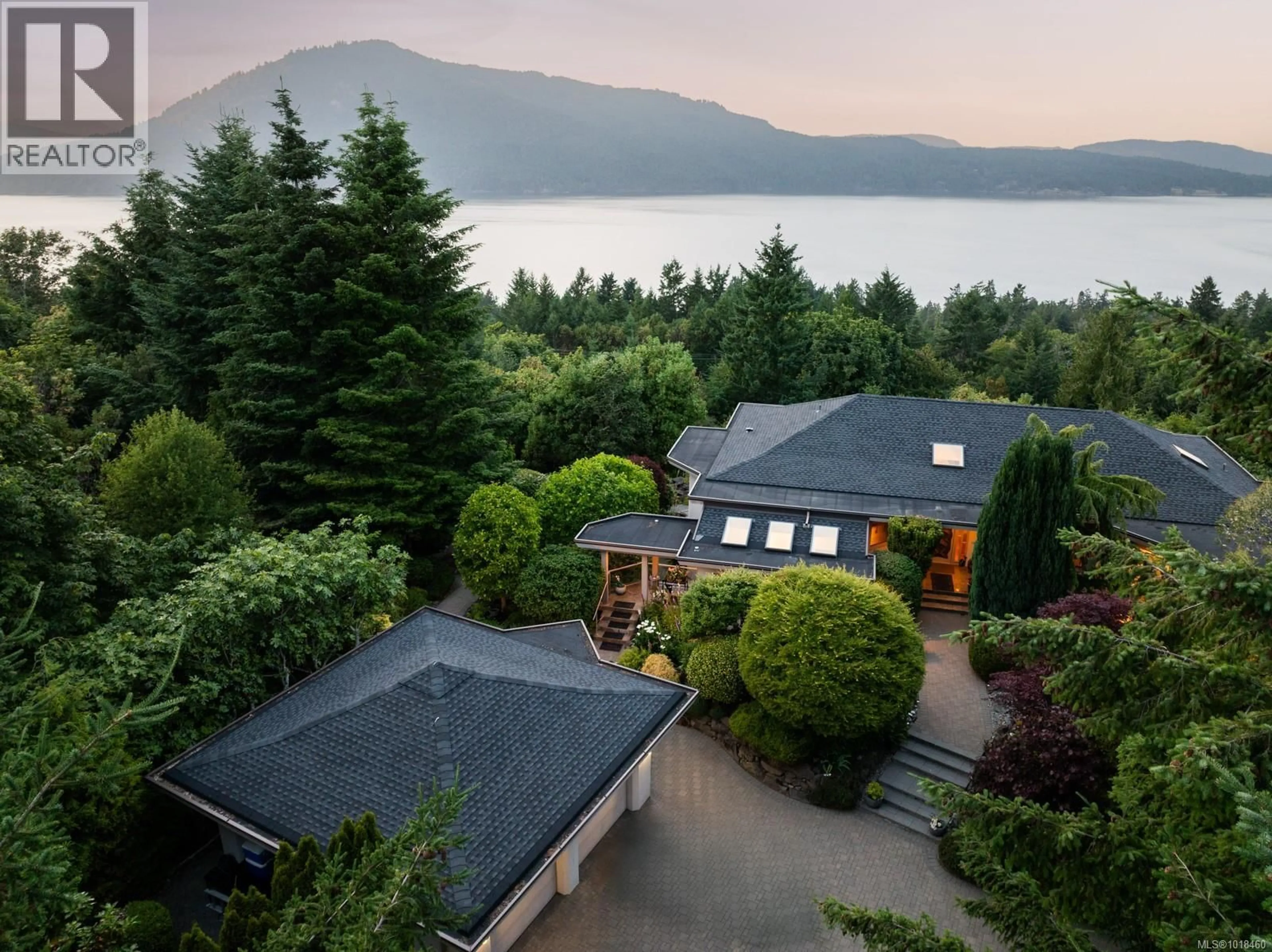 A pic from outside/outdoor area/front of a property/back of a property/a pic from drone, water/lake/river/ocean view for 11406 SYCAMORE DRIVE, North Saanich British Columbia V8L5J9