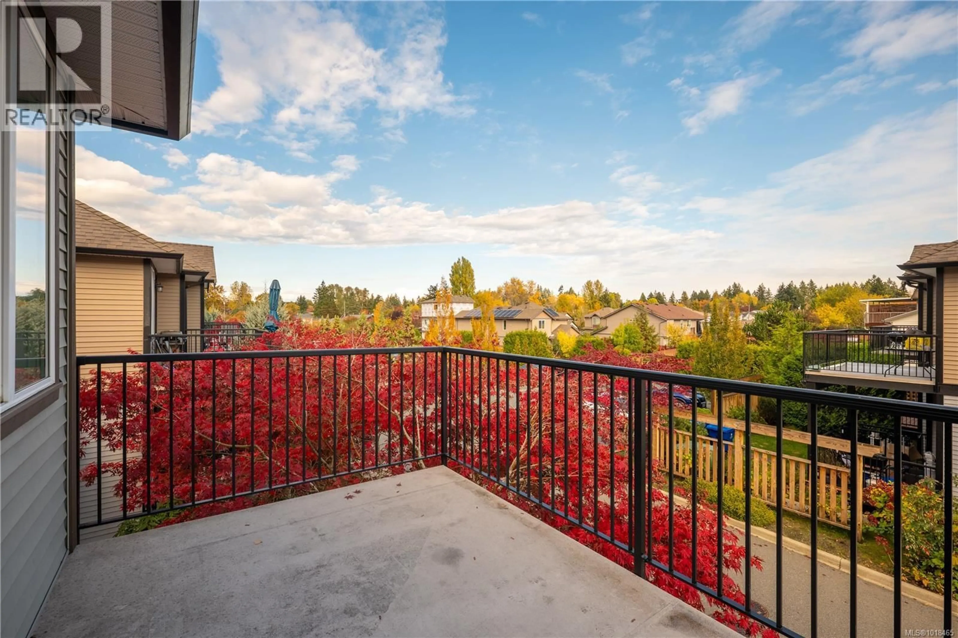 Patio, city buildings view from balcony for 1004 CASSELL PLACE, Nanaimo British Columbia V9R0C9