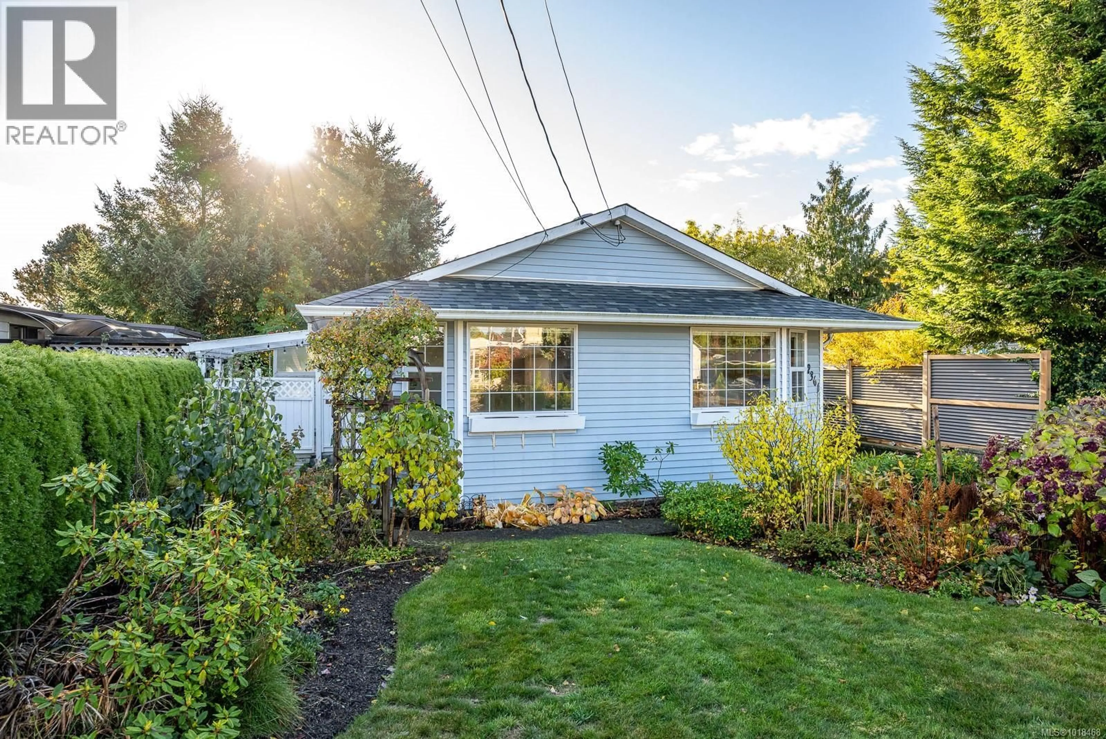 Home with vinyl exterior material, street for 2361 6TH STREET EAST, Courtenay British Columbia V9N7T8