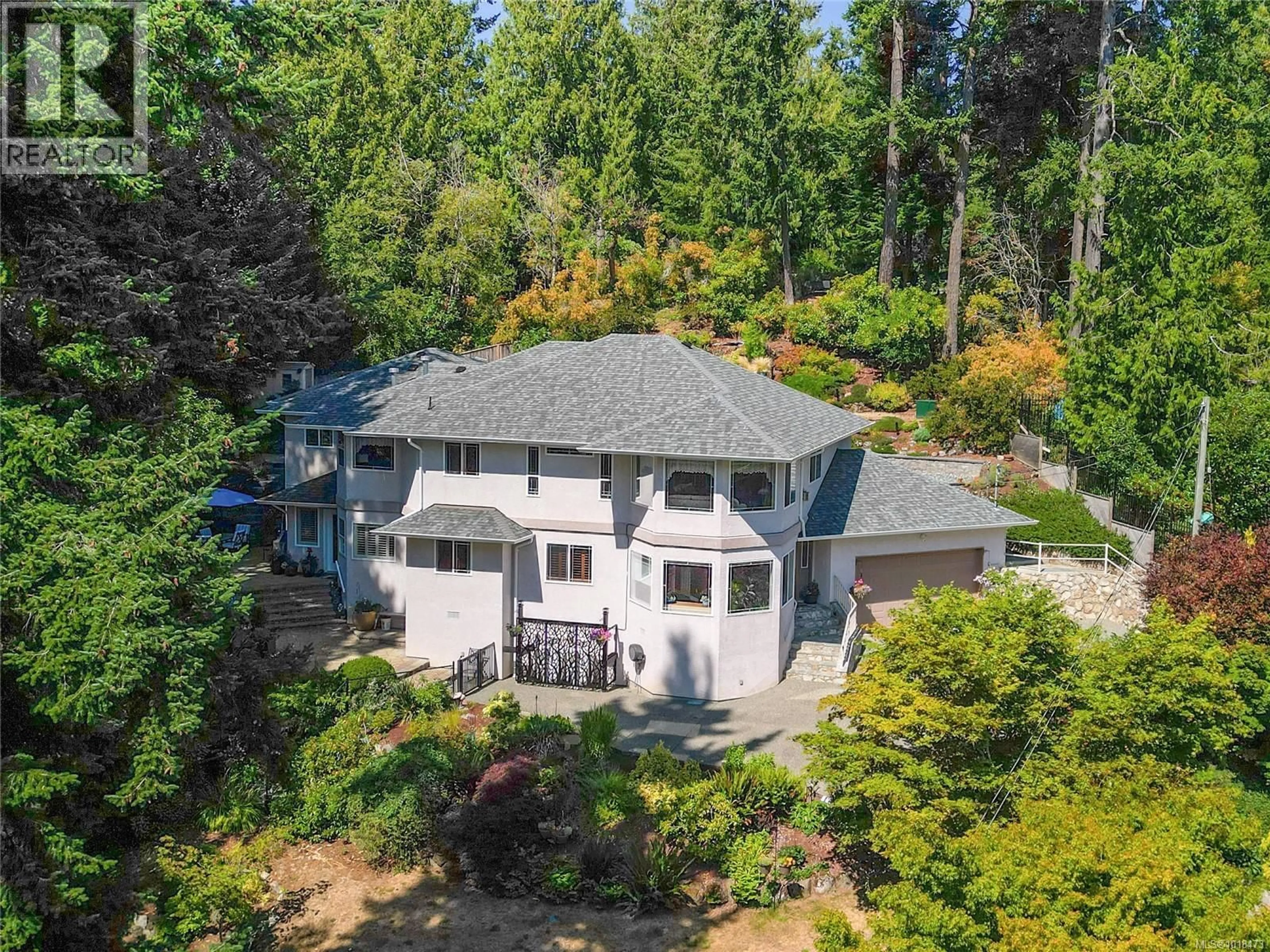 A pic from outside/outdoor area/front of a property/back of a property/a pic from drone, water/lake/river/ocean view for 2250 TRYON ROAD, North Saanich British Columbia V8L5H7