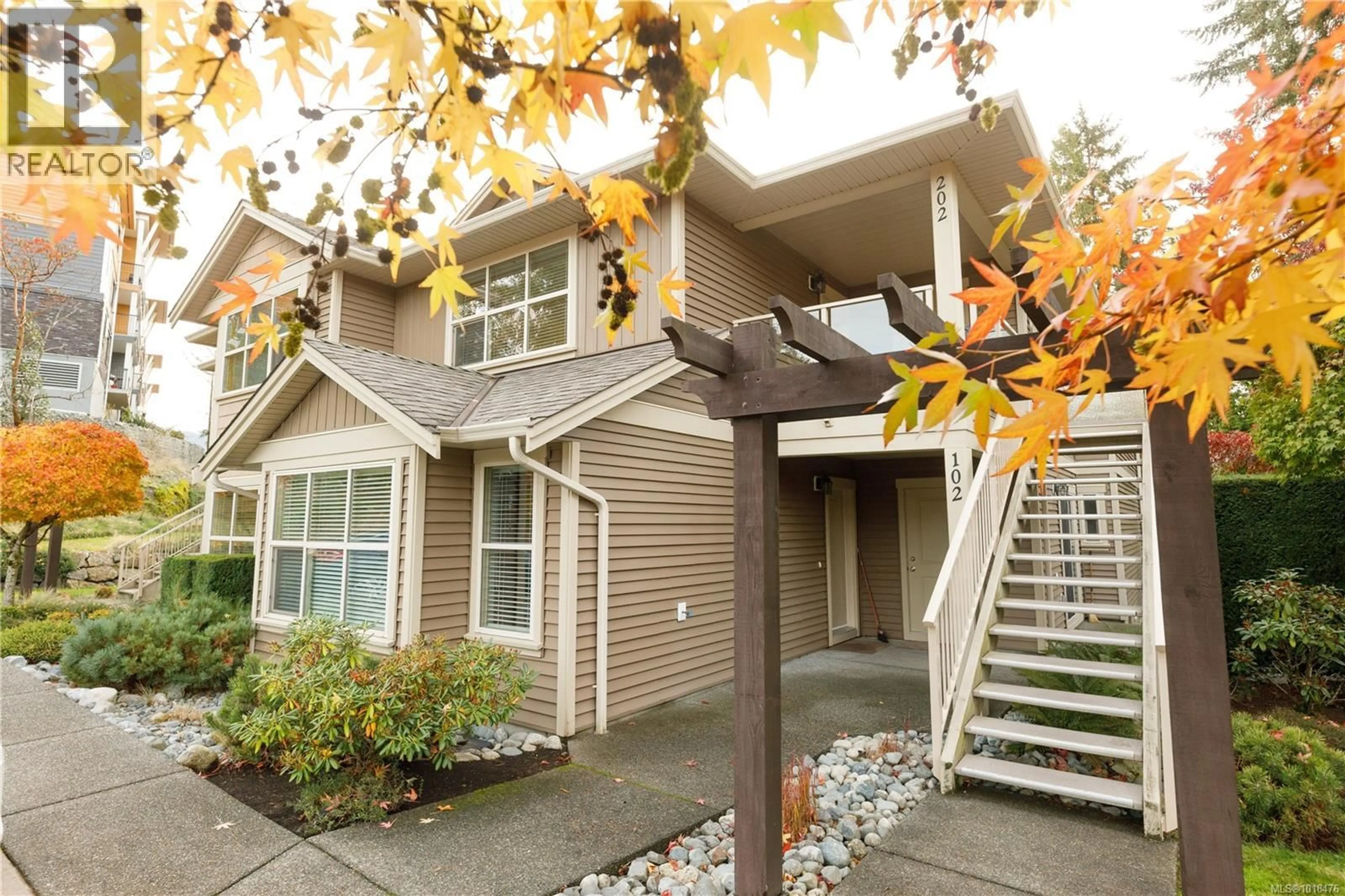 Home with vinyl exterior material, street for 202 - 4460 HEDGESTONE PLACE, Nanaimo British Columbia V9T0E6