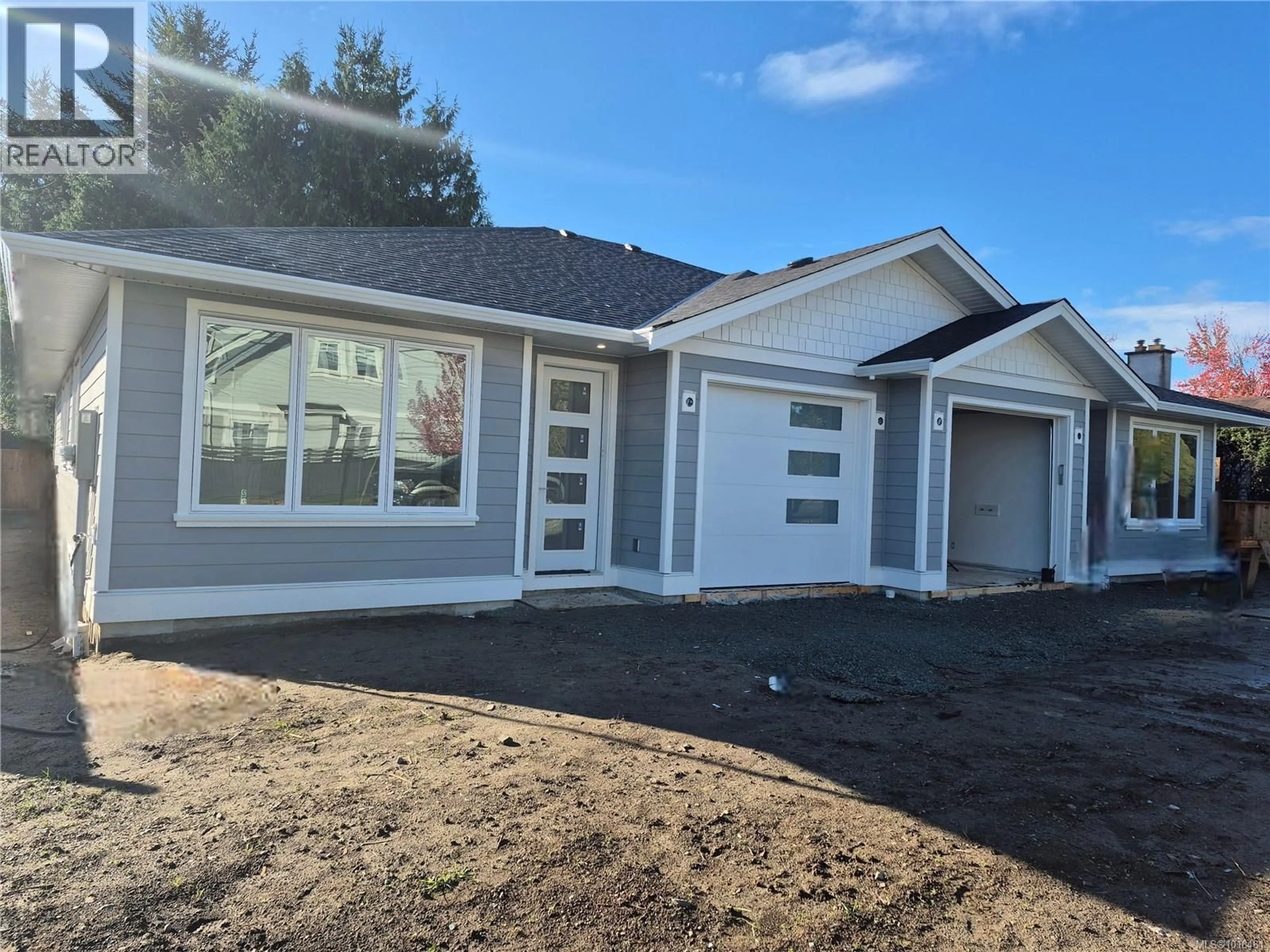Home with vinyl exterior material, street for 2261 ARDWELL AVENUE, Sidney British Columbia V8L2M2