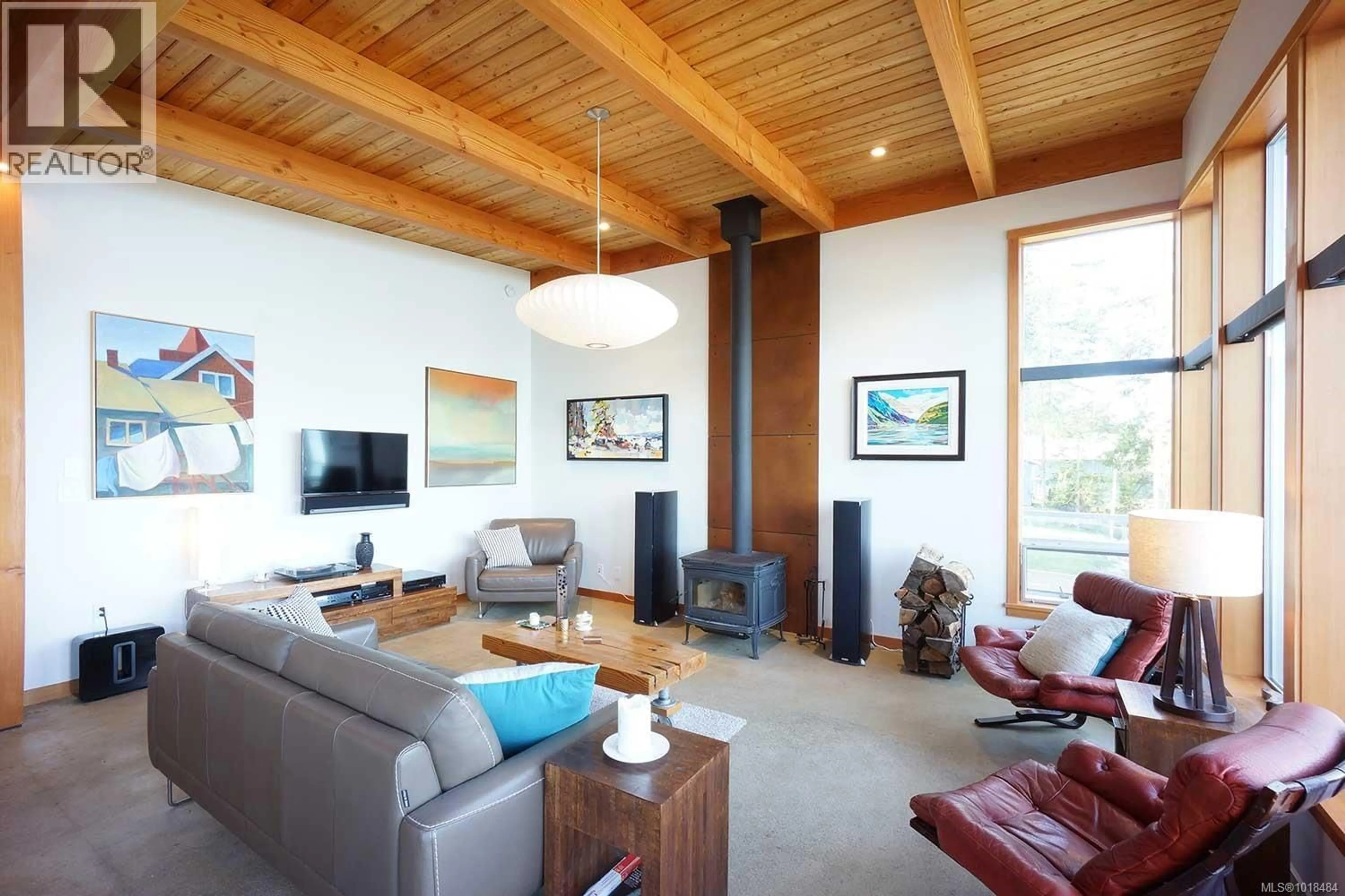 Living room with furniture, wood/laminate floor for 3870 EAST ROAD, Denman Island British Columbia V0R1T0