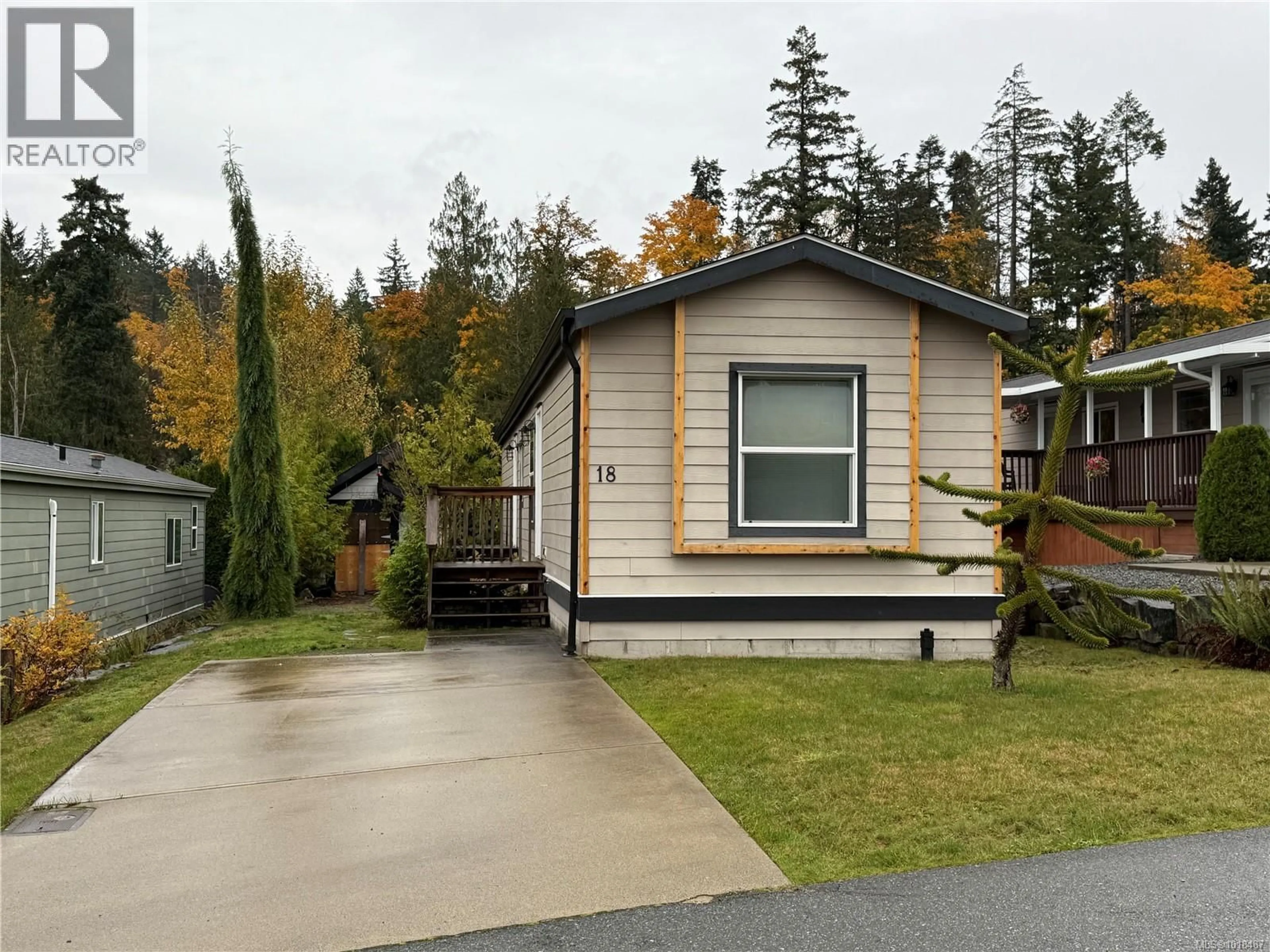 Home with vinyl exterior material, street for 18 - 525 JIM CRAM DRIVE, Ladysmith British Columbia V9G0A5