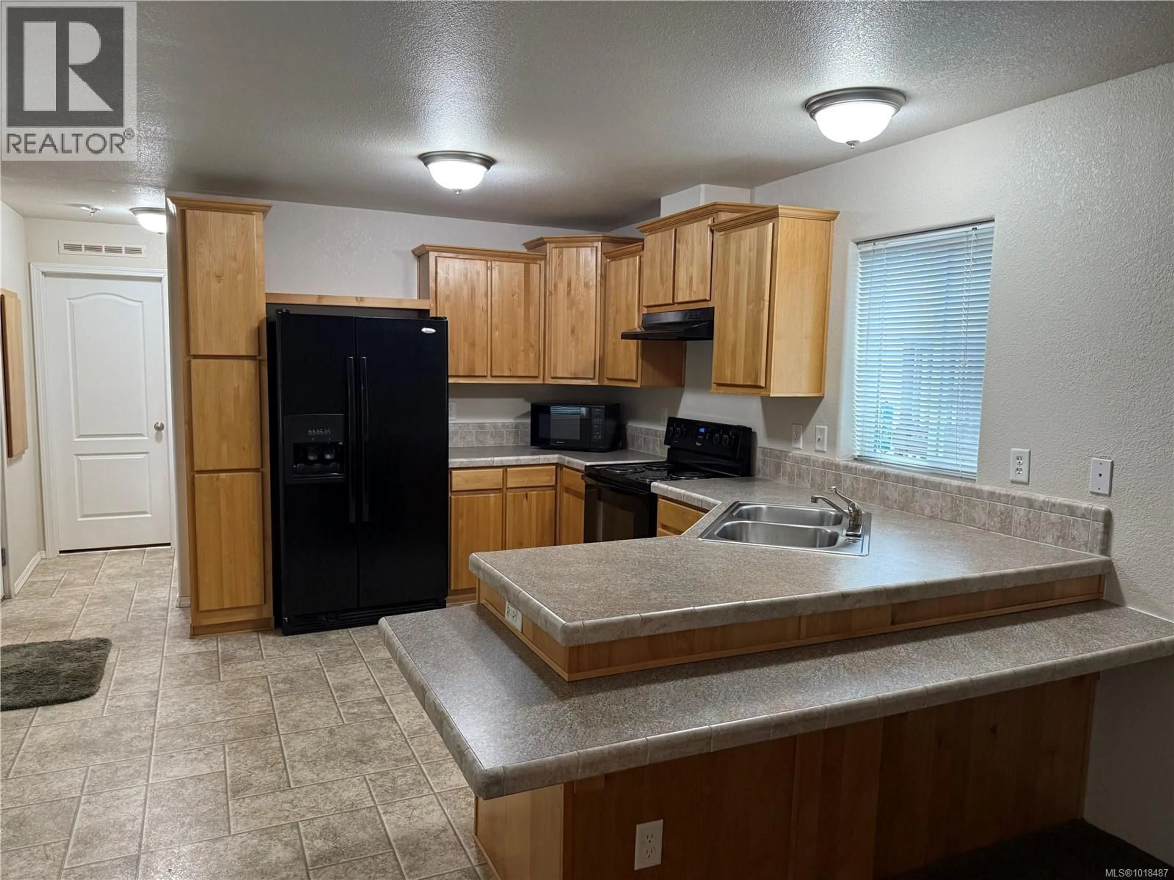 Standard kitchen, ceramic/tile floor for 18 - 525 JIM CRAM DRIVE, Ladysmith British Columbia V9G0A5