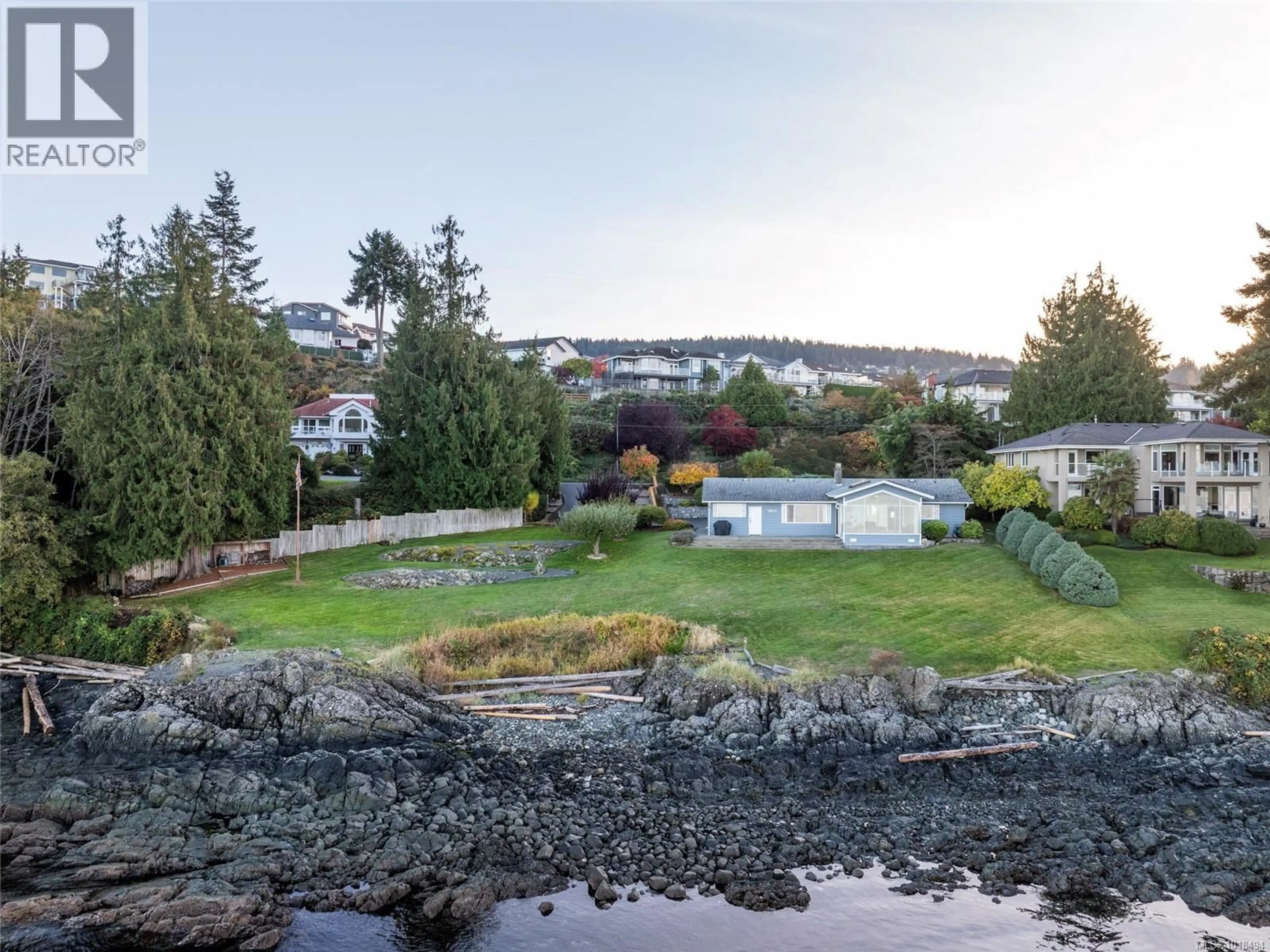 A pic from outside/outdoor area/front of a property/back of a property/a pic from drone, water/lake/river/ocean view for 5020/5010 FILLINGER CRESCENT, Nanaimo British Columbia V9V1J1