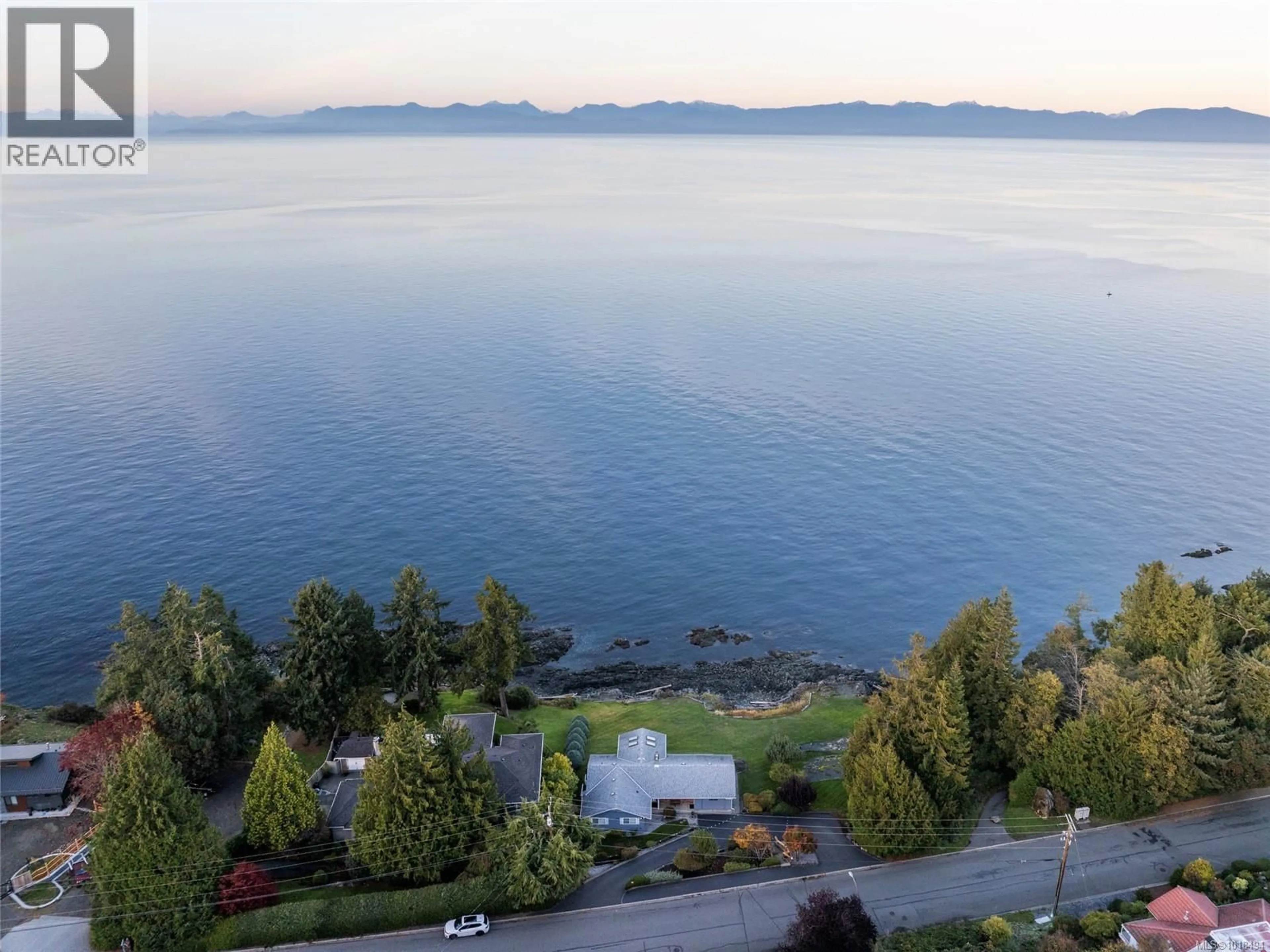 A pic from outside/outdoor area/front of a property/back of a property/a pic from drone, water/lake/river/ocean view for 5020/5010 FILLINGER CRESCENT, Nanaimo British Columbia V9V1J1