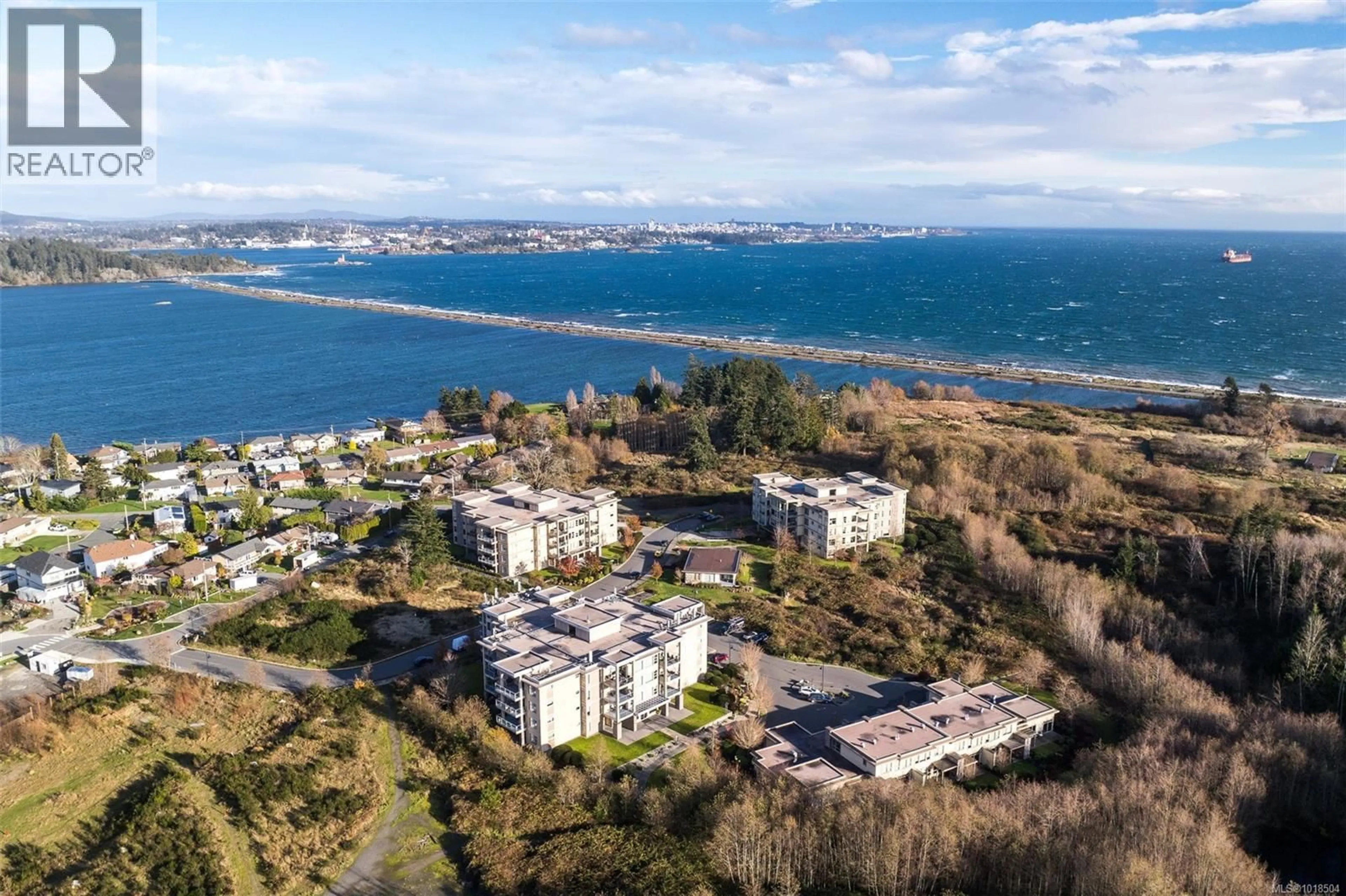 A pic from outside/outdoor area/front of a property/back of a property/a pic from drone, water/lake/river/ocean view for 403 - 3223 SELLECK WAY, Colwood British Columbia V9C0E7