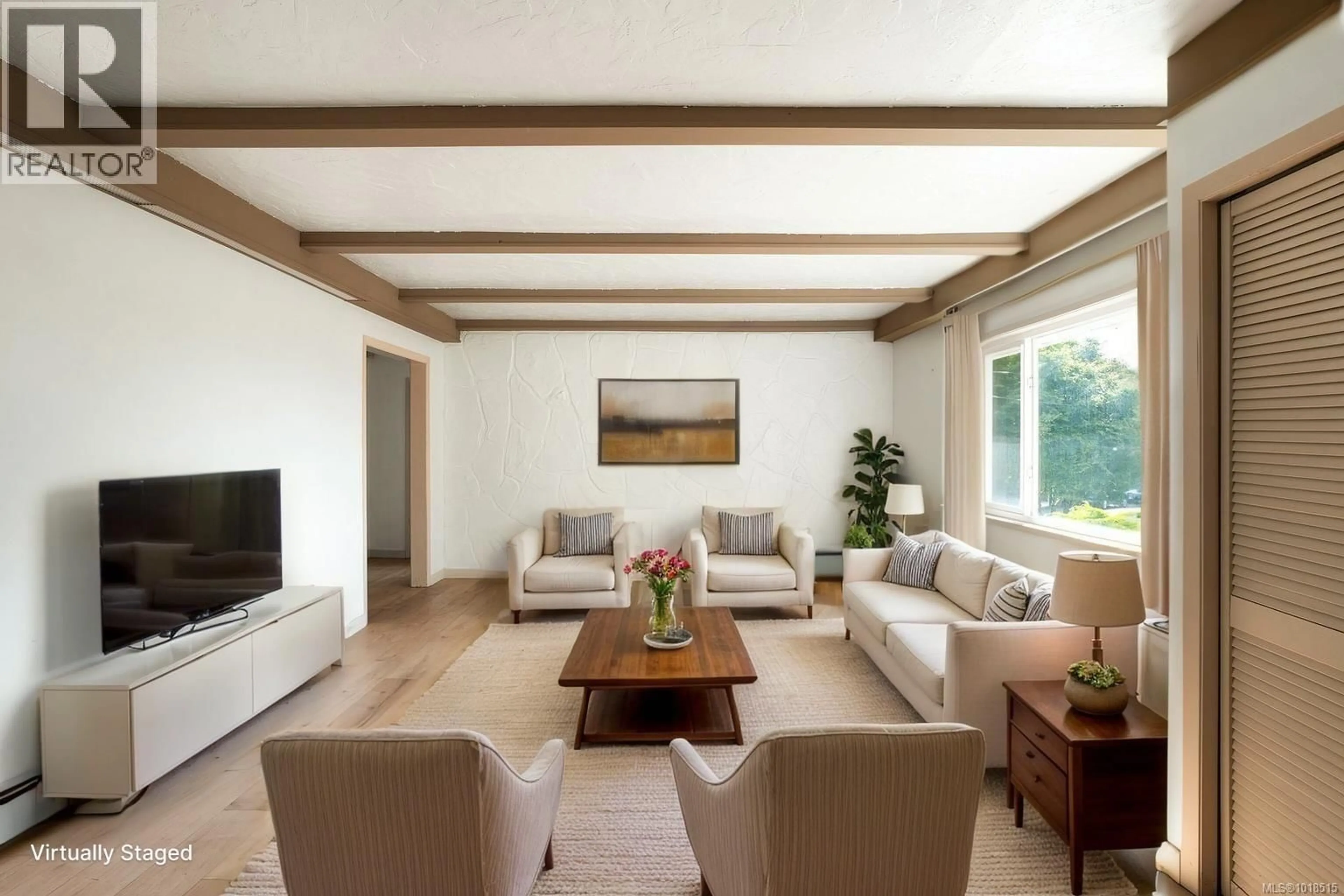 Living room with furniture, wood/laminate floor for 280 KING GEORGE TERRACE, Oak Bay British Columbia V8S2K2