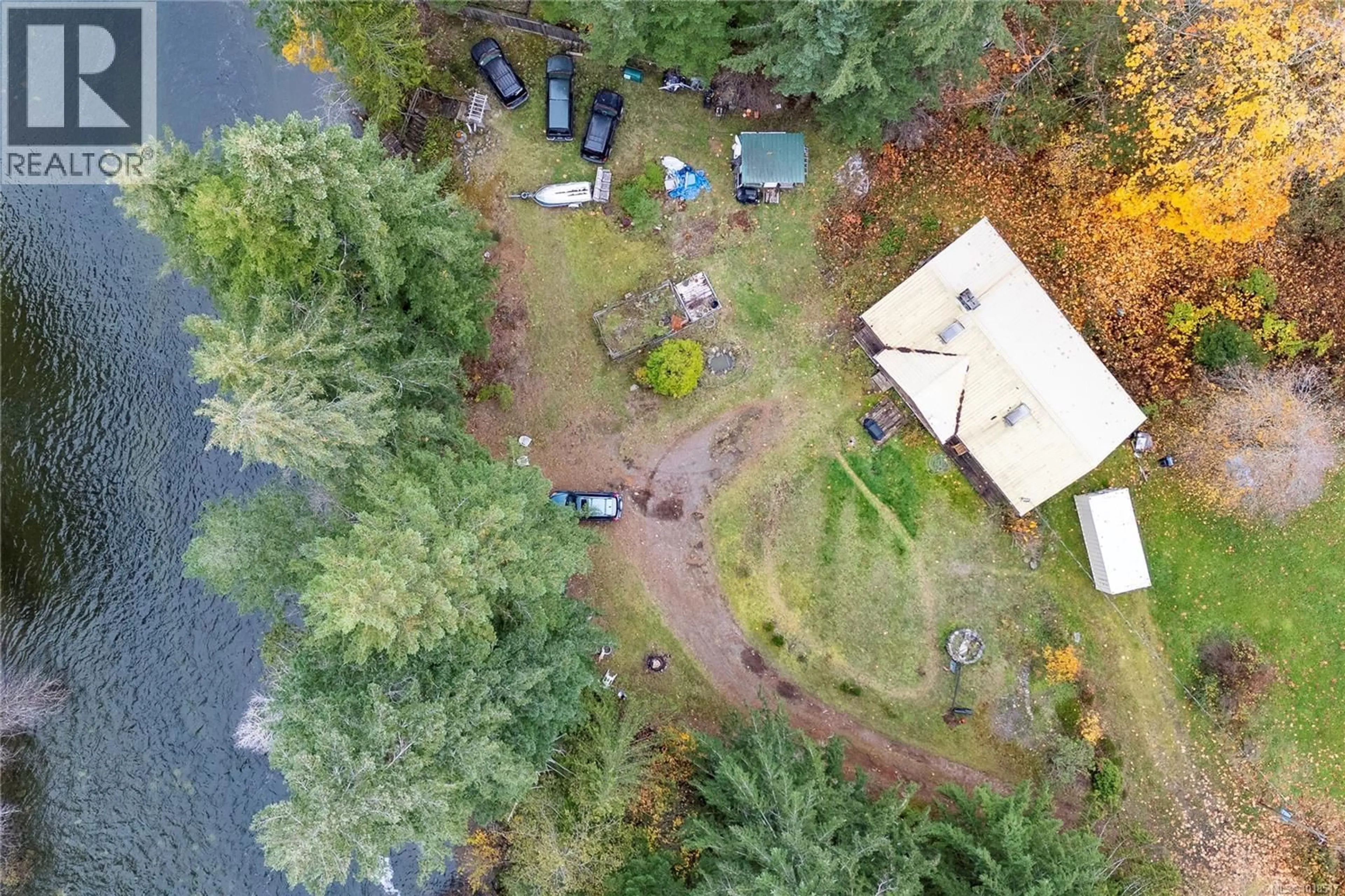 A pic from outside/outdoor area/front of a property/back of a property/a pic from drone, water/lake/river/ocean view for 9571 GLEADLE ROAD, Black Creek British Columbia V9J1G1
