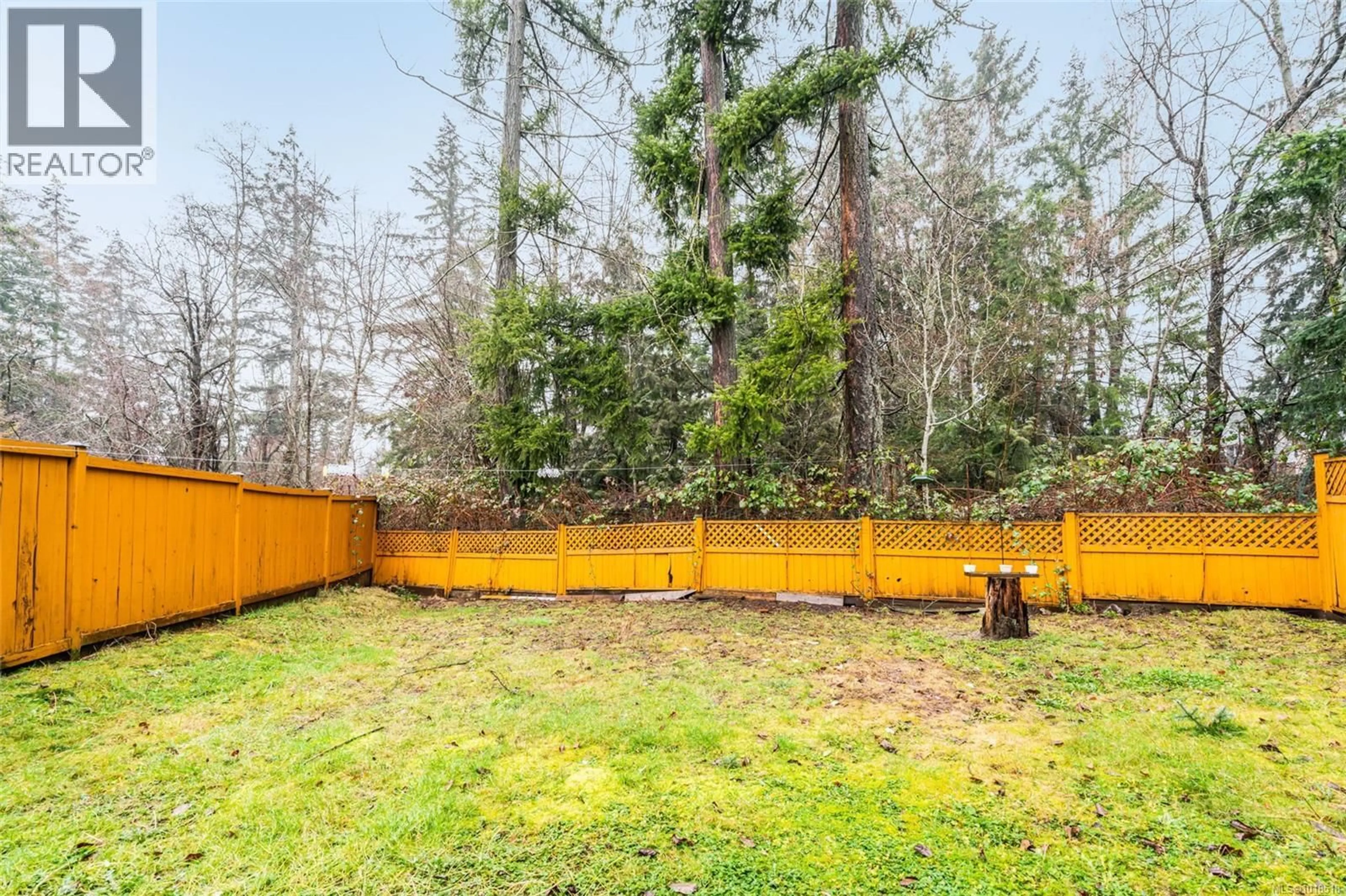 Patio, forest/trees view for 101 - 5186 DUNSTER ROAD, Nanaimo British Columbia V9T2Z2
