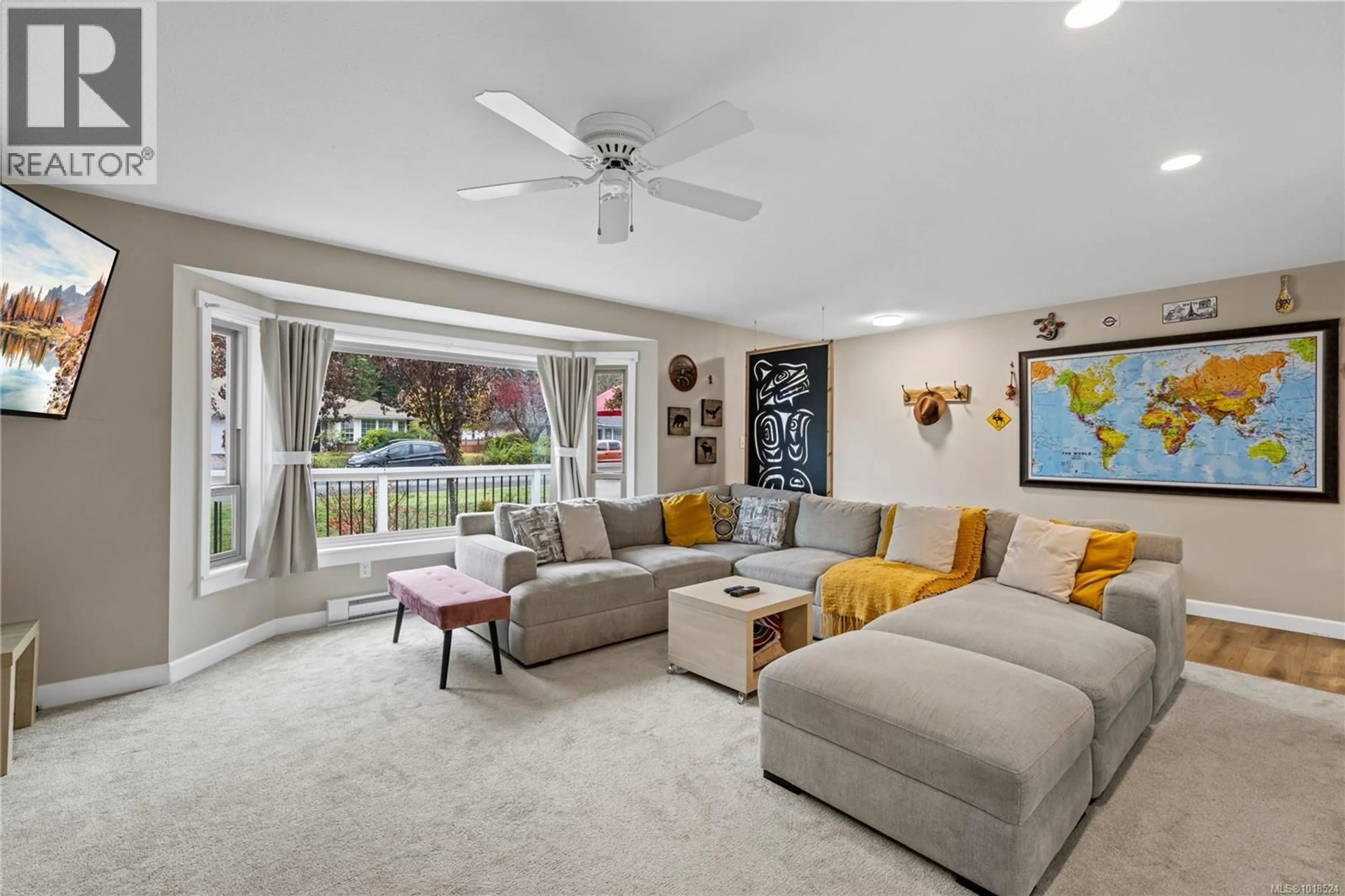 Living room with furniture, unknown for 217 VALDEZ AVENUE, Qualicum Beach British Columbia V9K1R8