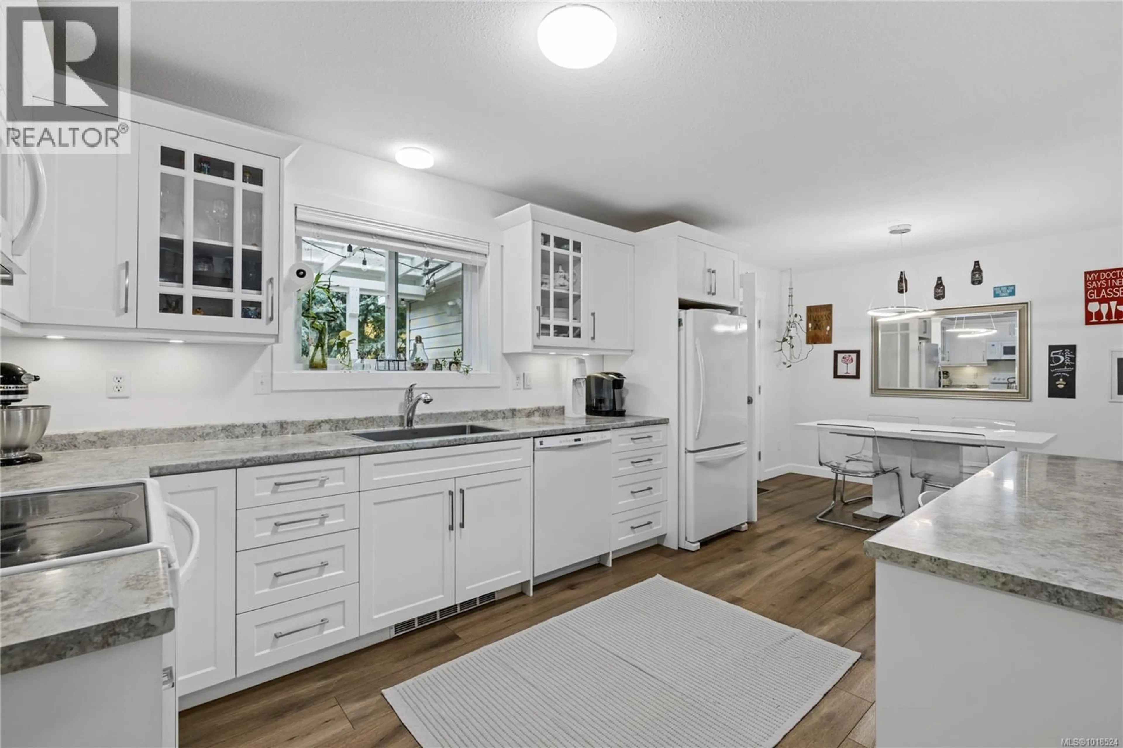 Open concept kitchen, ceramic/tile floor for 217 VALDEZ AVENUE, Qualicum Beach British Columbia V9K1R8