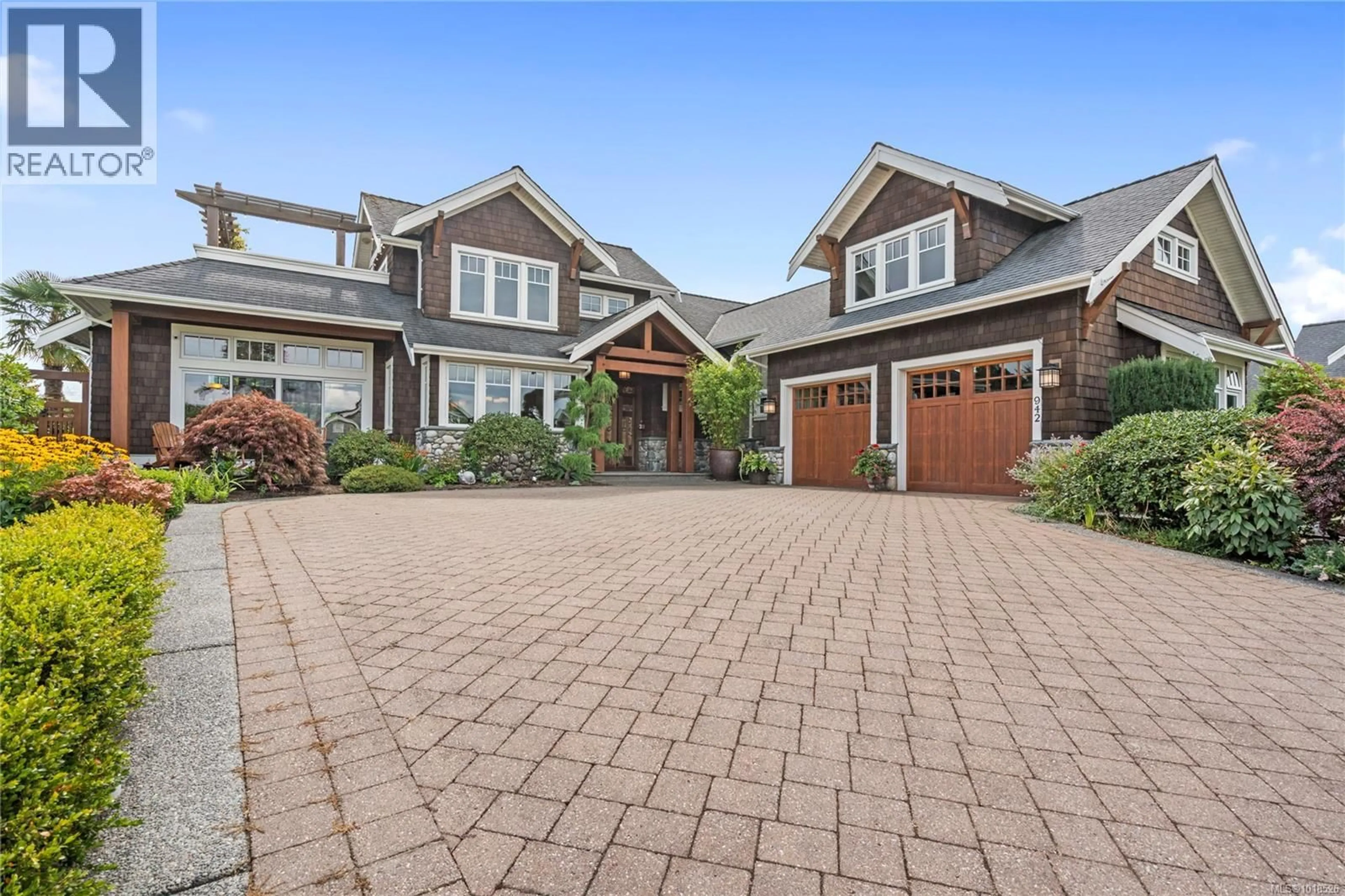 Home with brick exterior material, street for 942 BLUFFS DRIVE, Qualicum Beach British Columbia V9K0A2