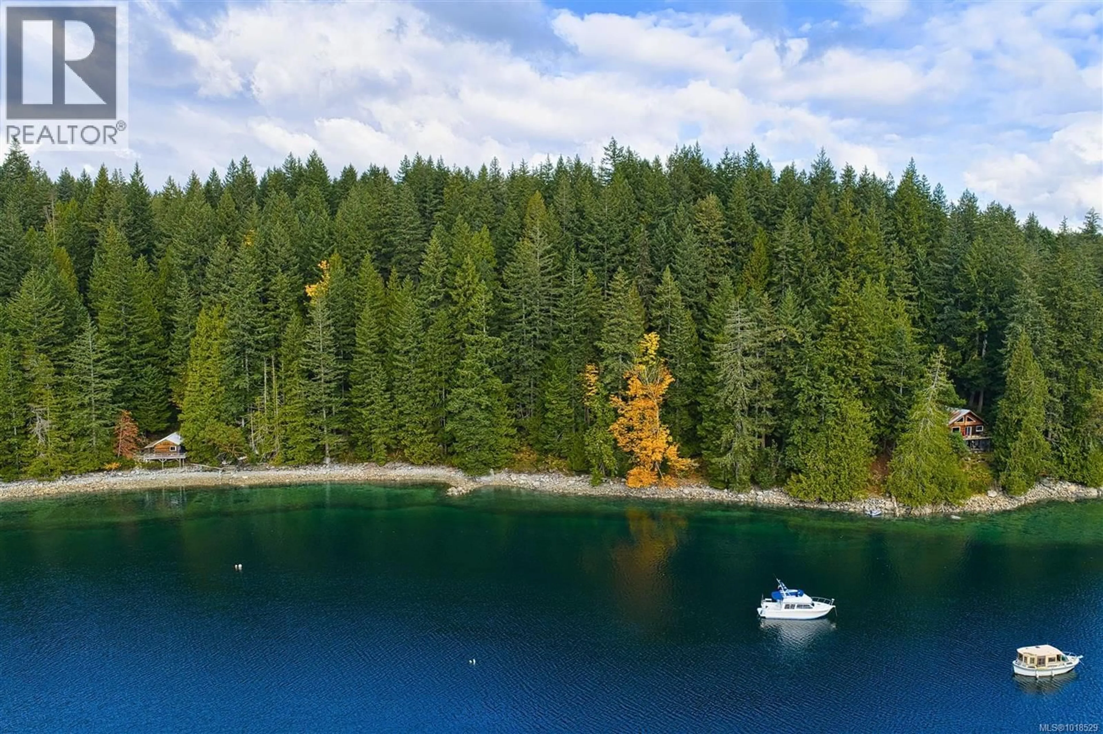 A pic from outside/outdoor area/front of a property/back of a property/a pic from drone, water/lake/river/ocean view for 525 WHALETOWN ROAD, Cortes Island British Columbia V0P1Z0