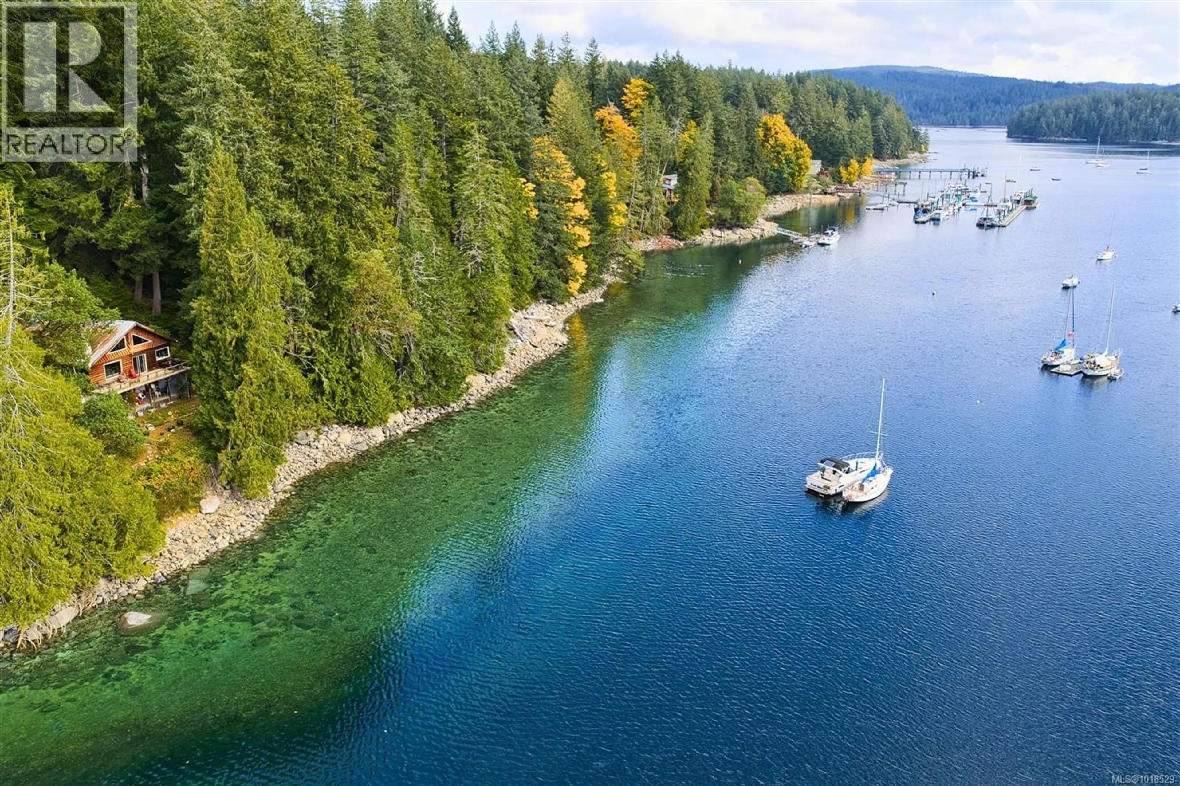 A pic from outside/outdoor area/front of a property/back of a property/a pic from drone, water/lake/river/ocean view for 525 WHALETOWN ROAD, Cortes Island British Columbia V0P1Z0