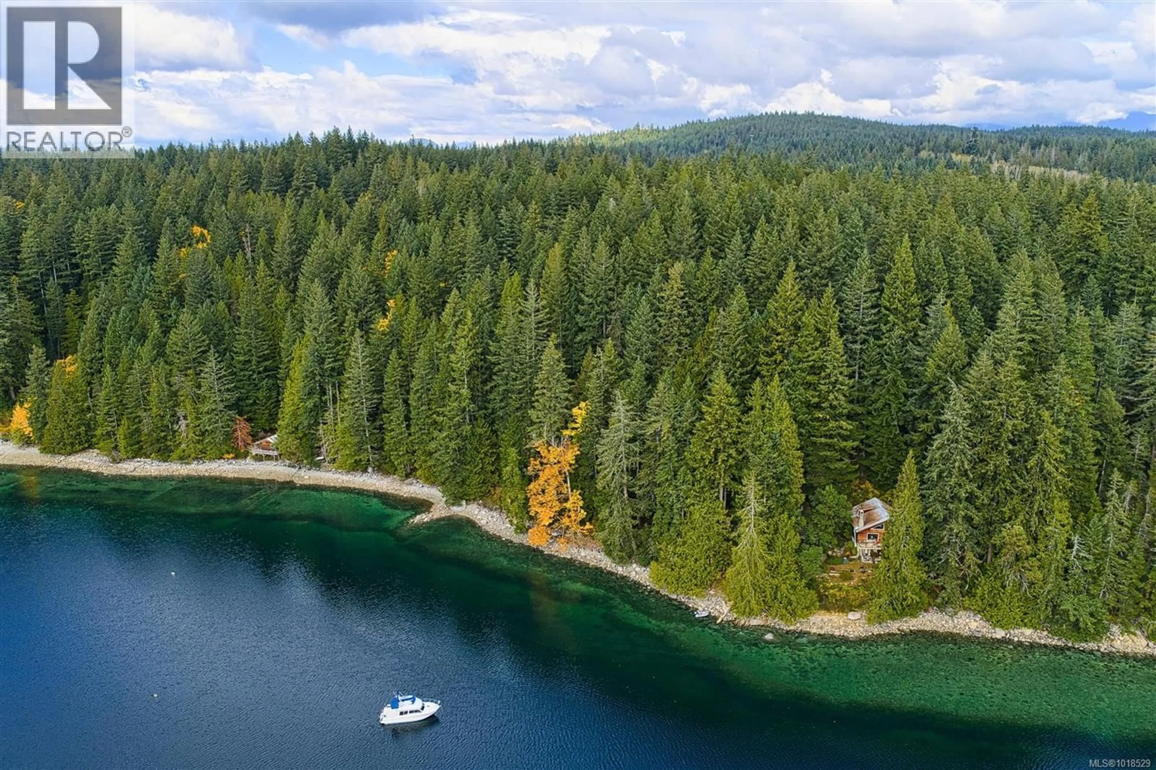 A pic from outside/outdoor area/front of a property/back of a property/a pic from drone, water/lake/river/ocean view for 525 WHALETOWN ROAD, Cortes Island British Columbia V0P1Z0