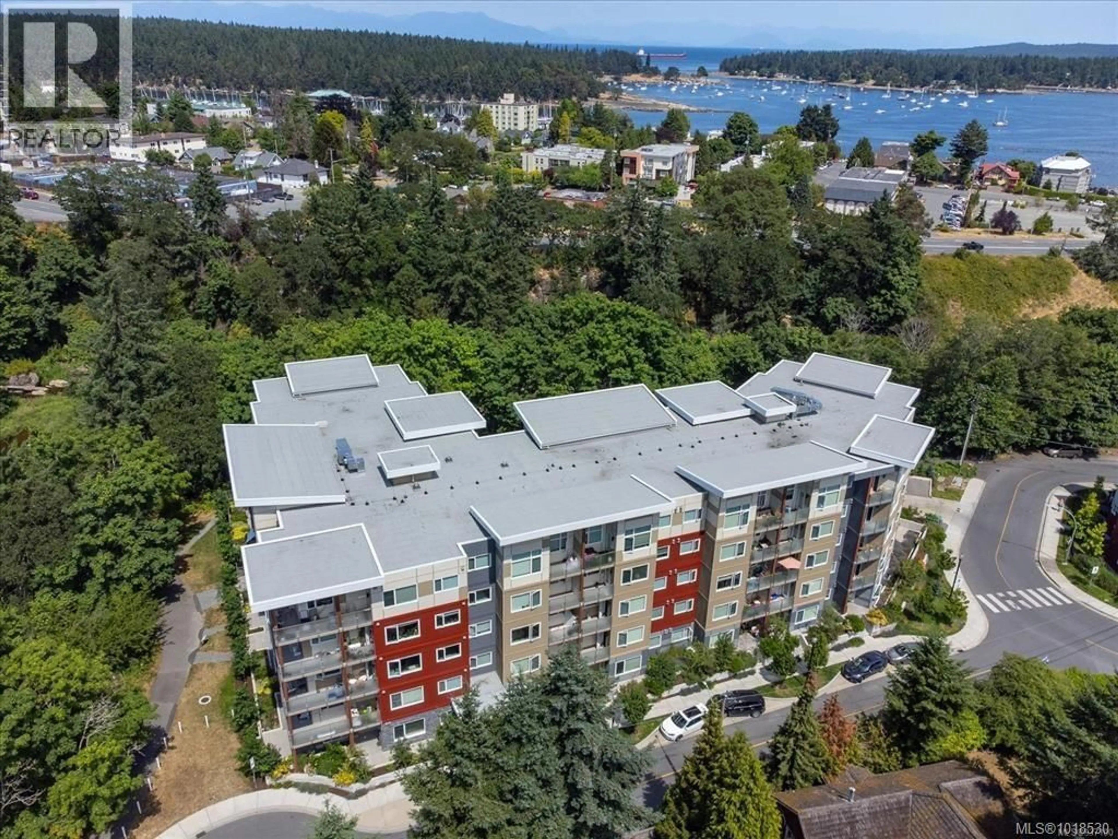 A pic from outside/outdoor area/front of a property/back of a property/a pic from drone, water/lake/river/ocean view for 312 - 20 BARSBY AVENUE, Nanaimo British Columbia V9R5V7