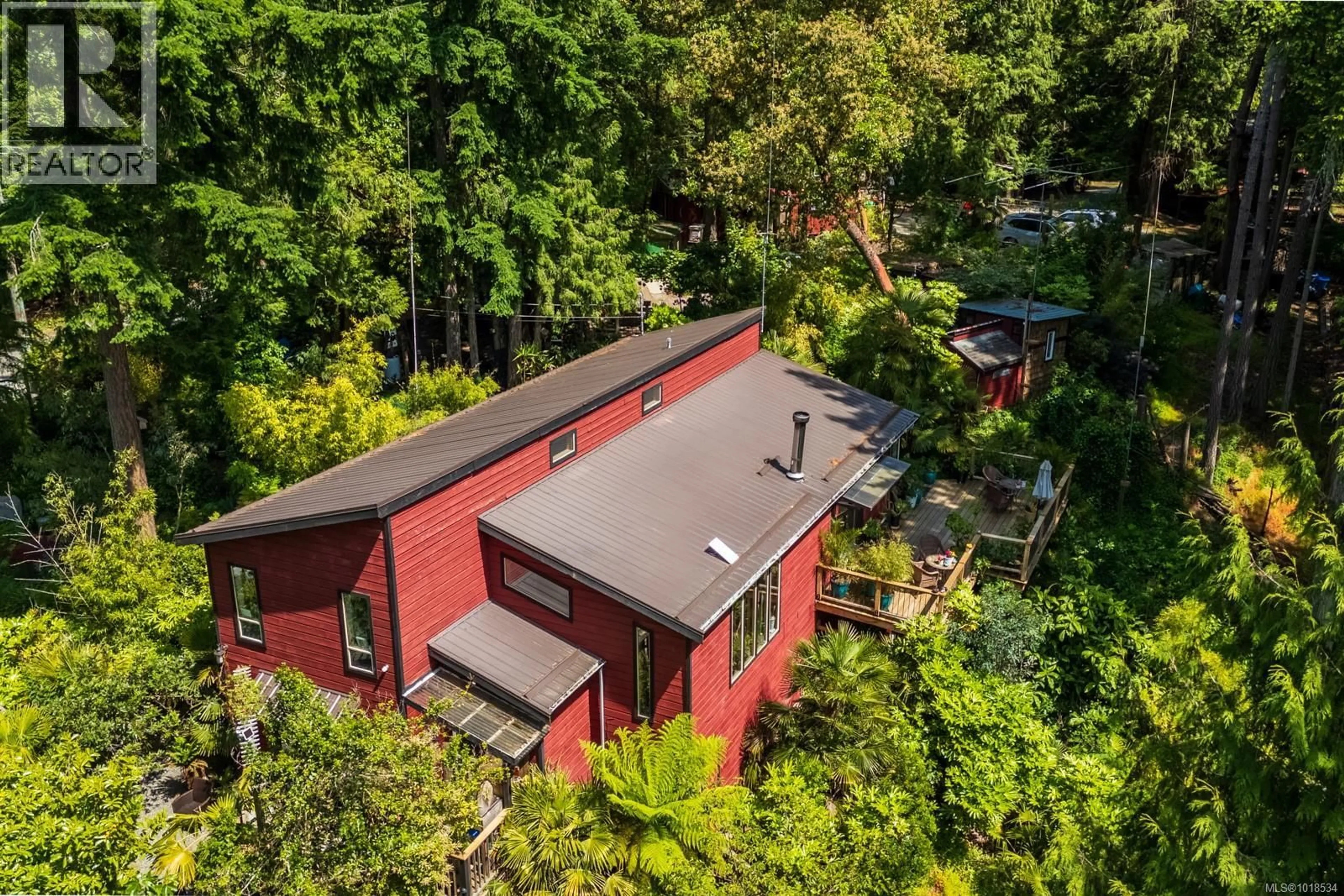A pic from outside/outdoor area/front of a property/back of a property/a pic from drone, forest/trees view for 2470 NORTH END ROAD, Salt Spring British Columbia V8K1A9
