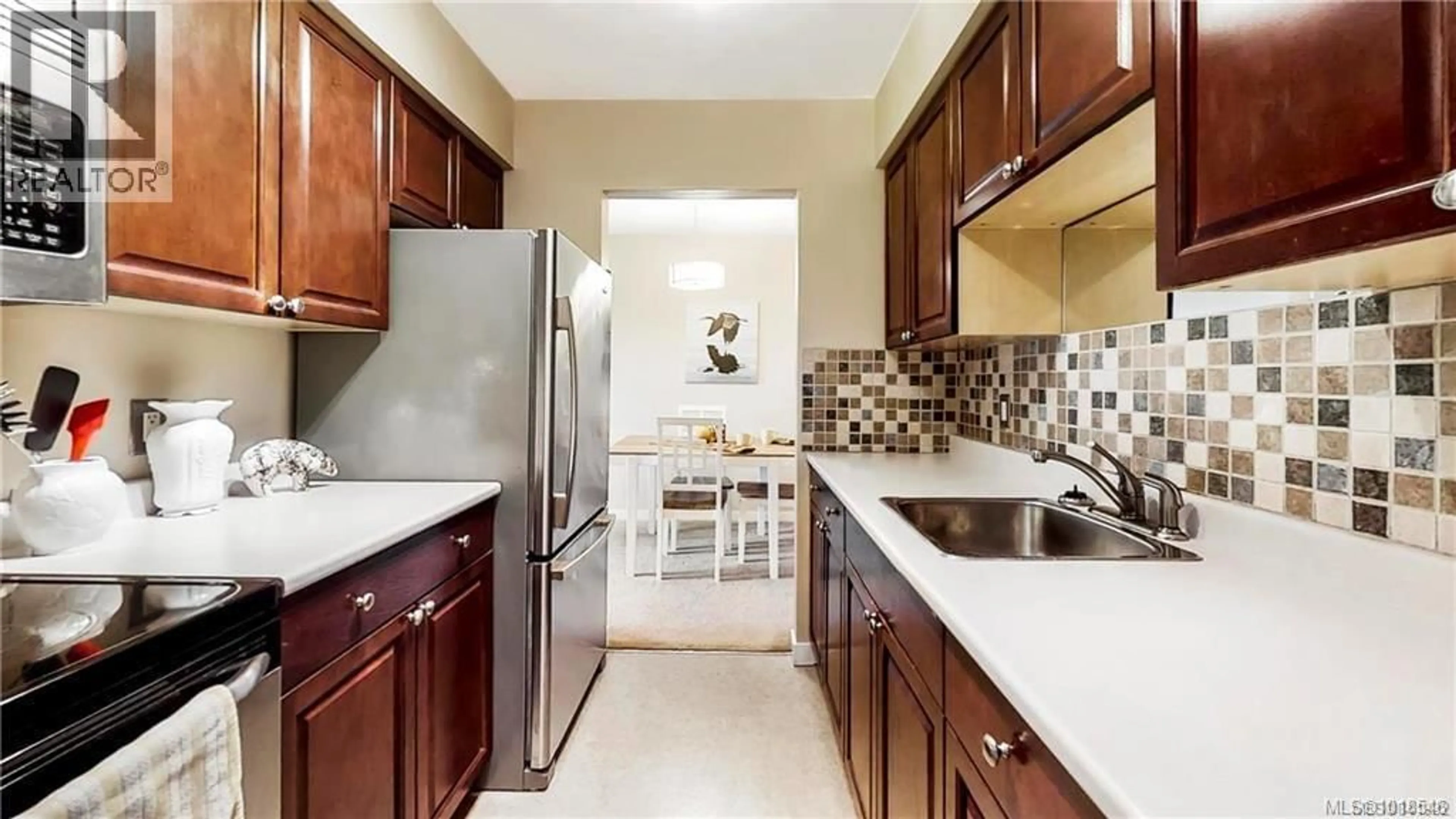 Standard kitchen, ceramic/tile floor for 303 - 1597 MIDGARD AVENUE, Saanich British Columbia V8P2Y2