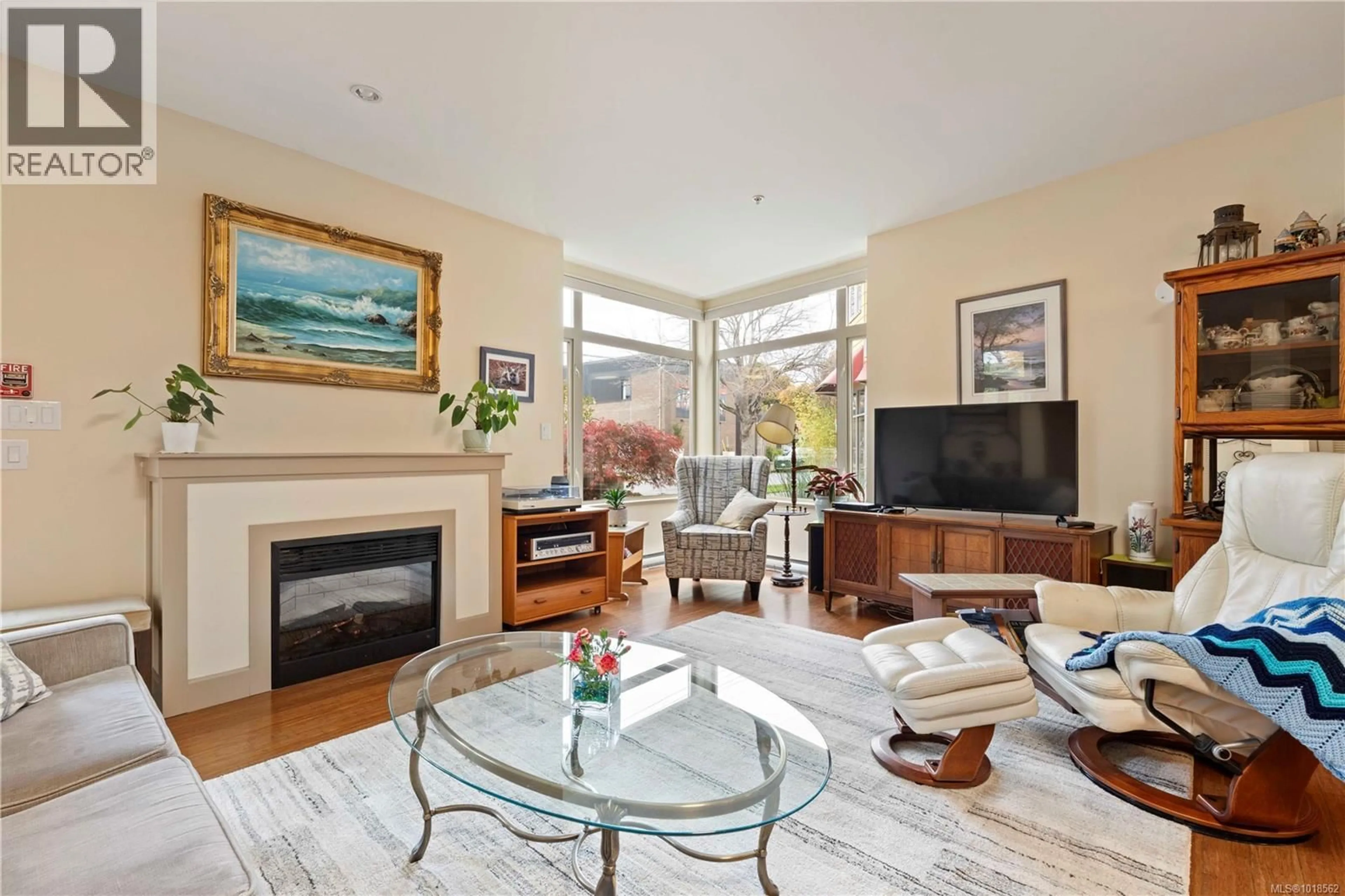 Living room with furniture, unknown for 105 - 1035 SUTLEJ STREET, Victoria British Columbia V8V2V9