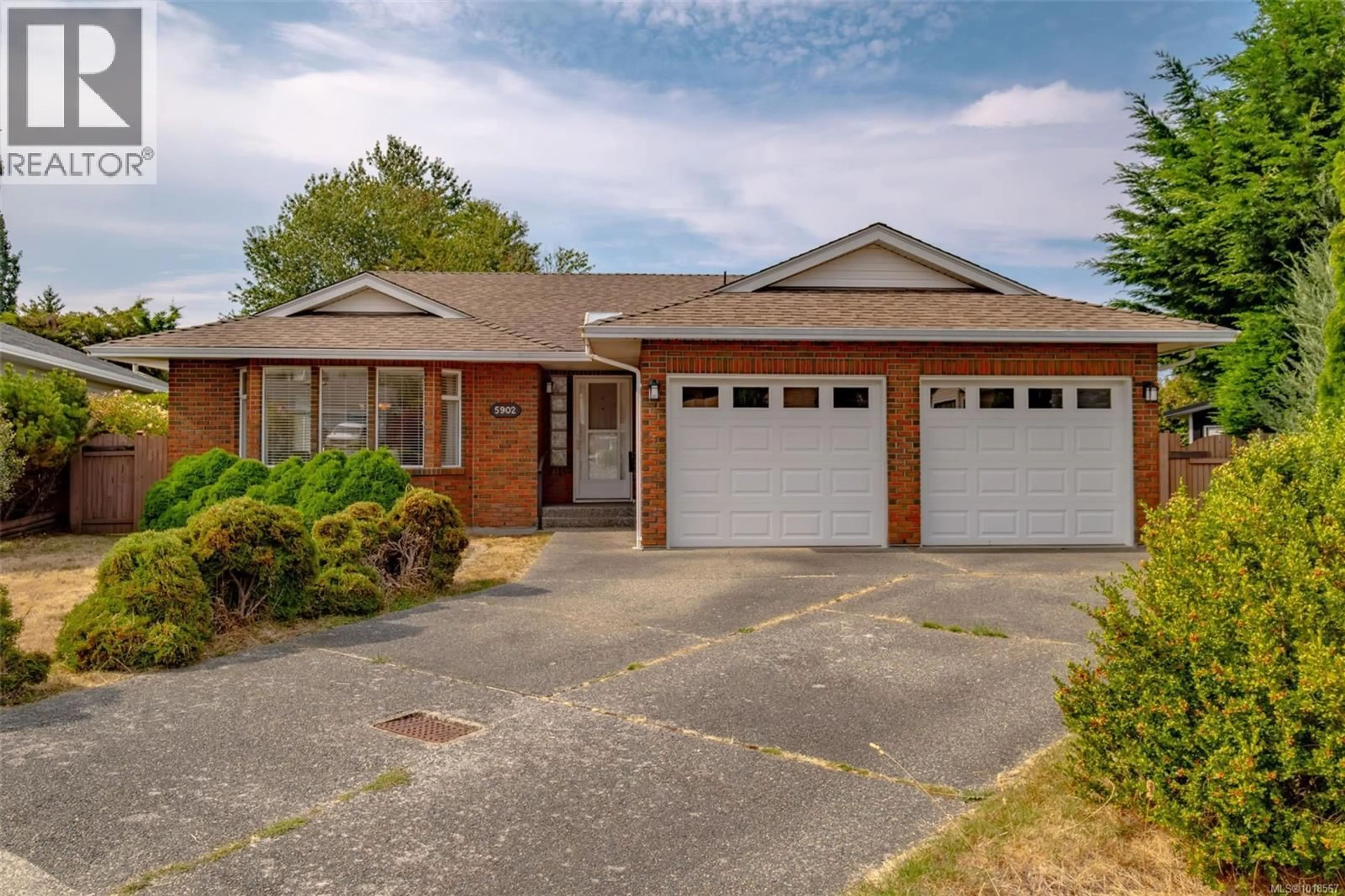 Home with brick exterior material, street for 5902 BEACON PLACE, Nanaimo British Columbia V9V1J6