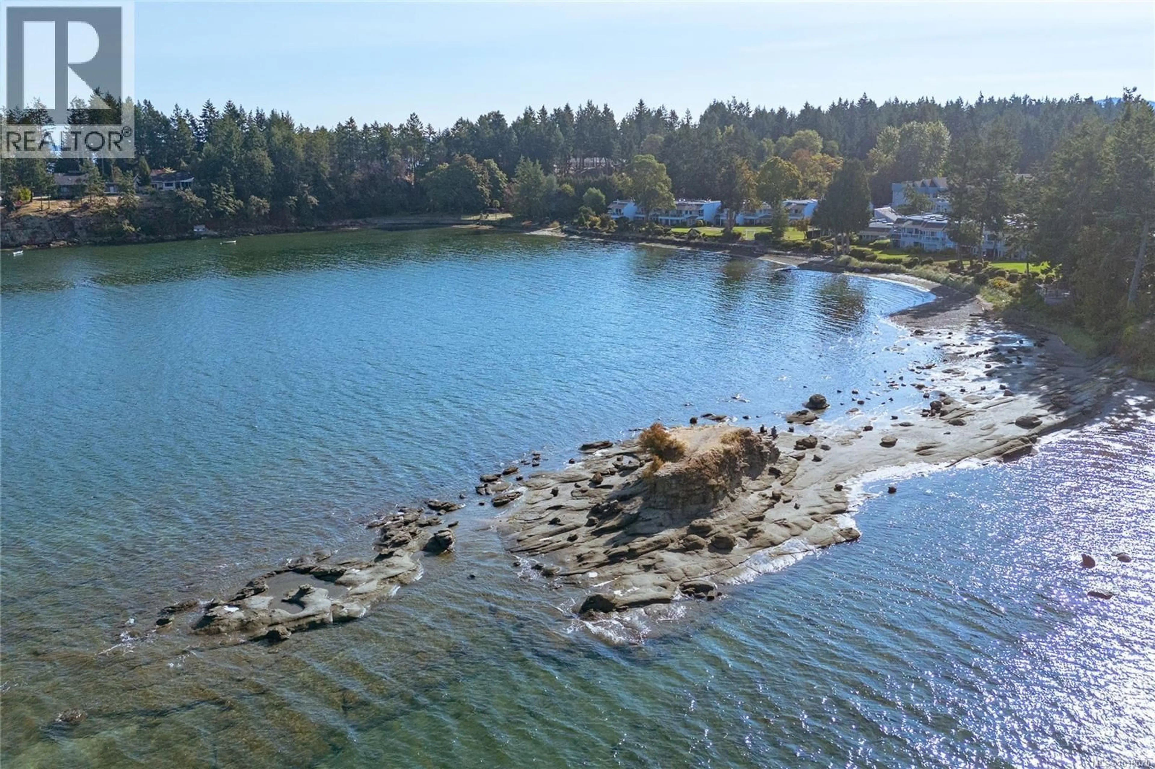 A pic from outside/outdoor area/front of a property/back of a property/a pic from drone, water/lake/river/ocean view for 717 - 1600 STROULGER ROAD, Nanoose Bay British Columbia V9P9B7