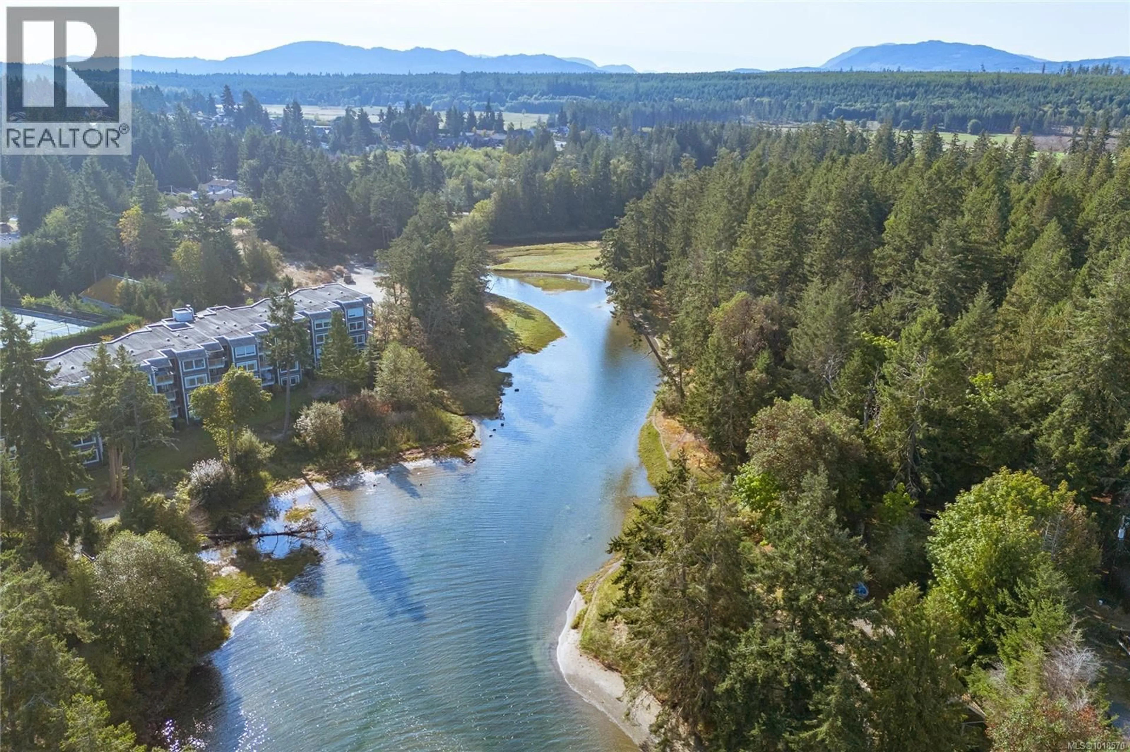 A pic from outside/outdoor area/front of a property/back of a property/a pic from drone, water/lake/river/ocean view for 717 - 1600 STROULGER ROAD, Nanoose Bay British Columbia V9P9B7