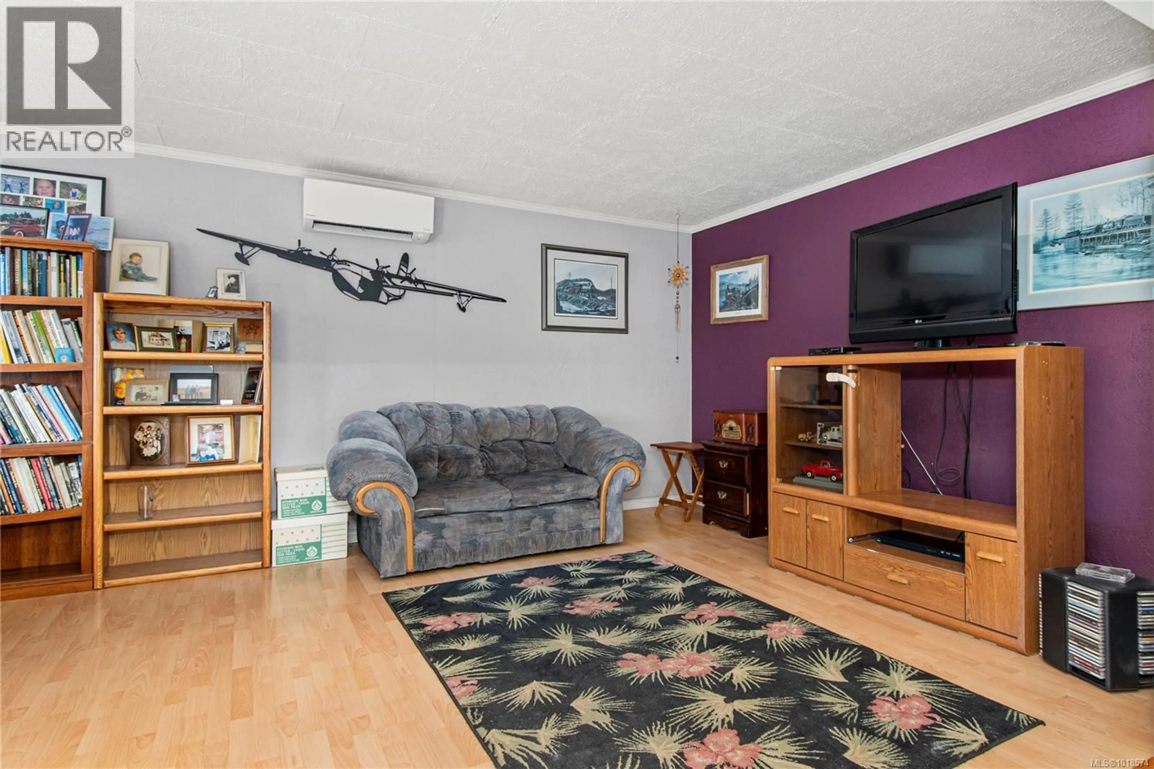 Living room with furniture, unknown for 2702 DERWENT AVENUE, Cumberland British Columbia V0R1S0