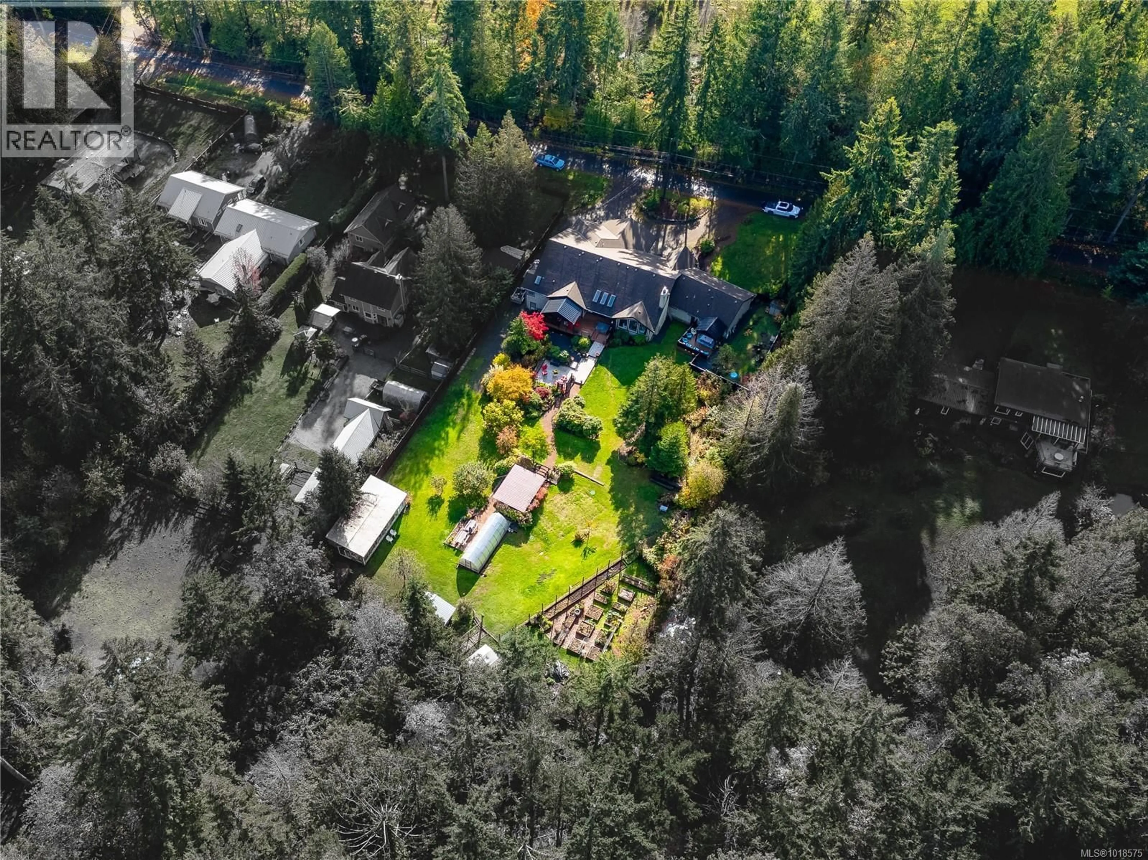 A pic from outside/outdoor area/front of a property/back of a property/a pic from drone, forest/trees view for 571 MEREDITH ROAD, Mill Bay British Columbia V8H1E7
