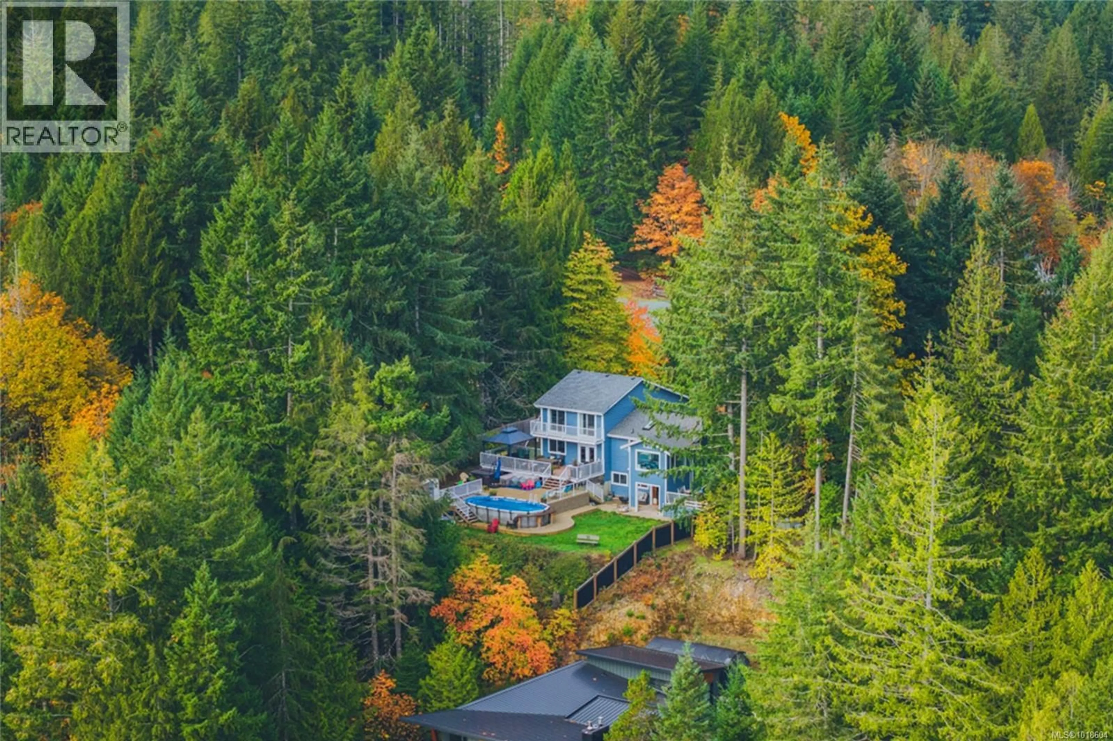 A pic from outside/outdoor area/front of a property/back of a property/a pic from drone, forest/trees view for 10550 ASHER ROAD, Port Alberni British Columbia V9Y9A2