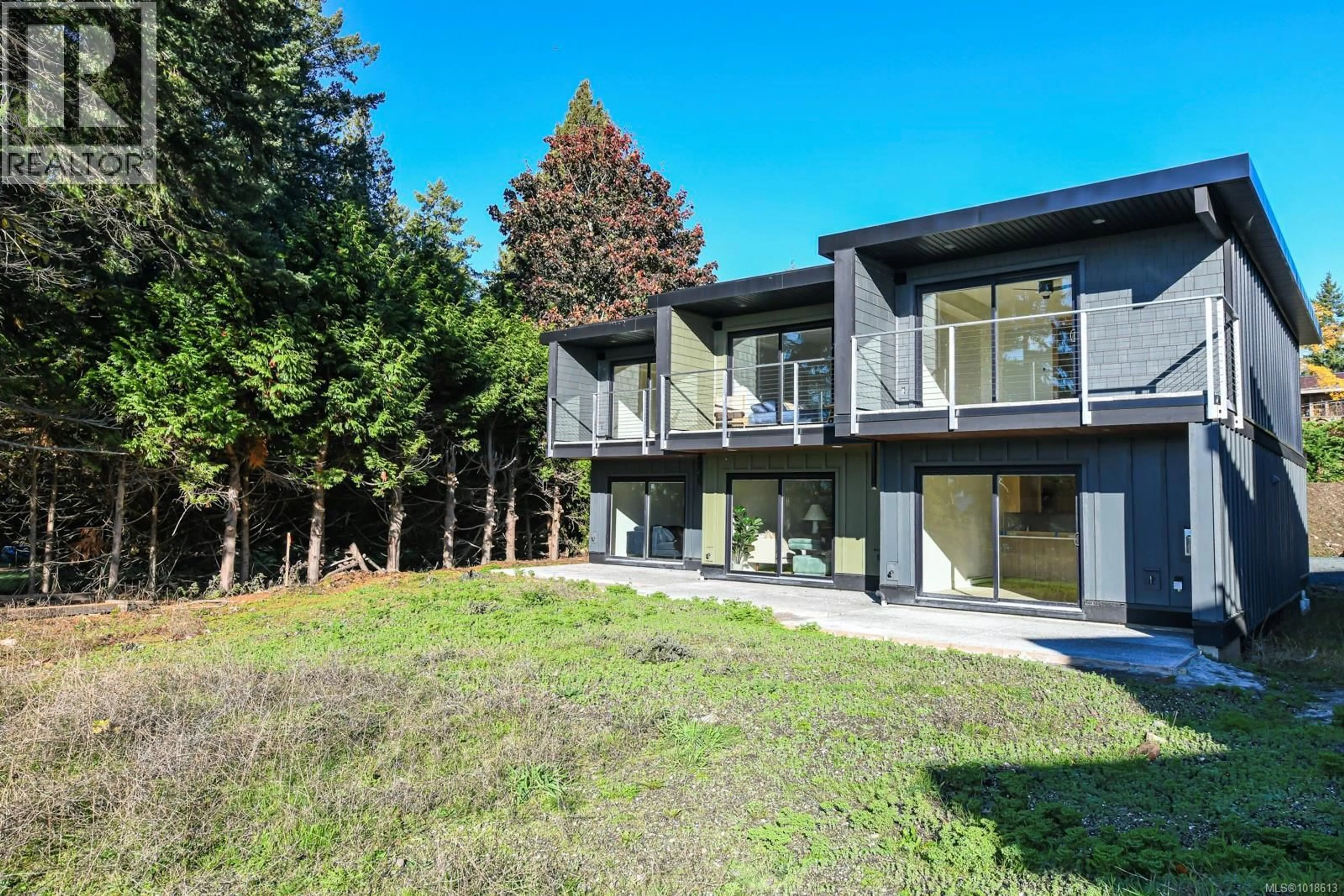 A pic from outside/outdoor area/front of a property/back of a property/a pic from drone, unknown for 211 - 4305 SHINGLE SPIT ROAD, Hornby Island British Columbia V0R1Z0