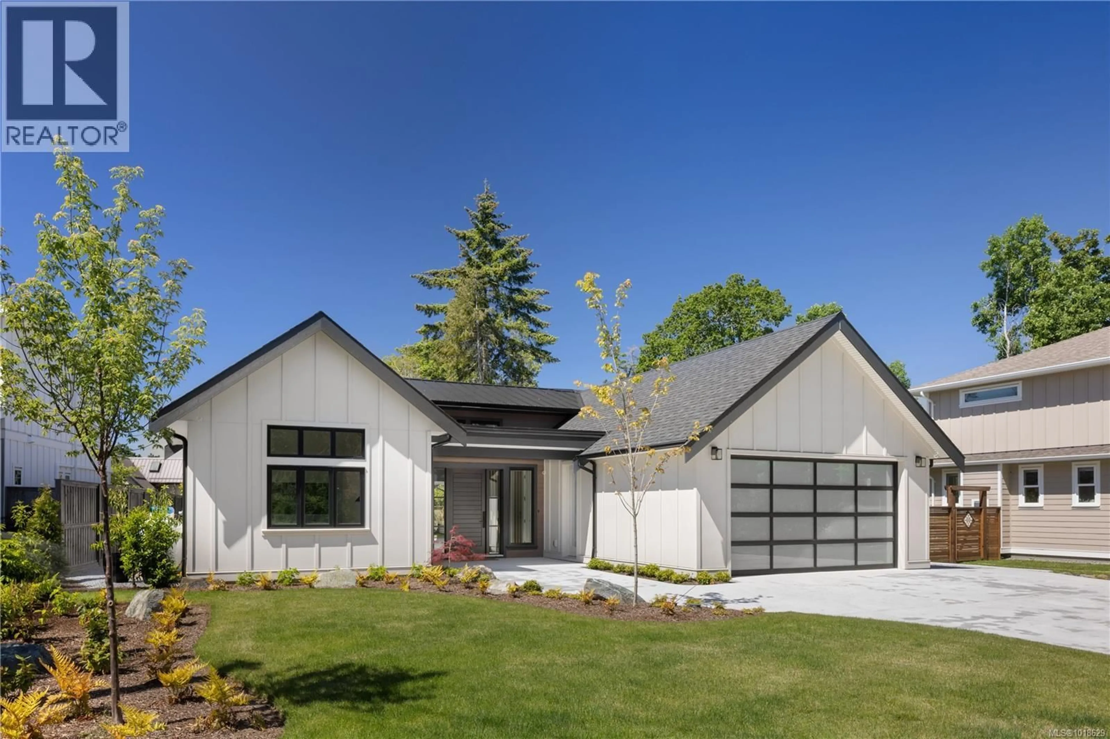 Home with vinyl exterior material, street for 10210 TSAYKUM ROAD, North Saanich British Columbia V8L5T6