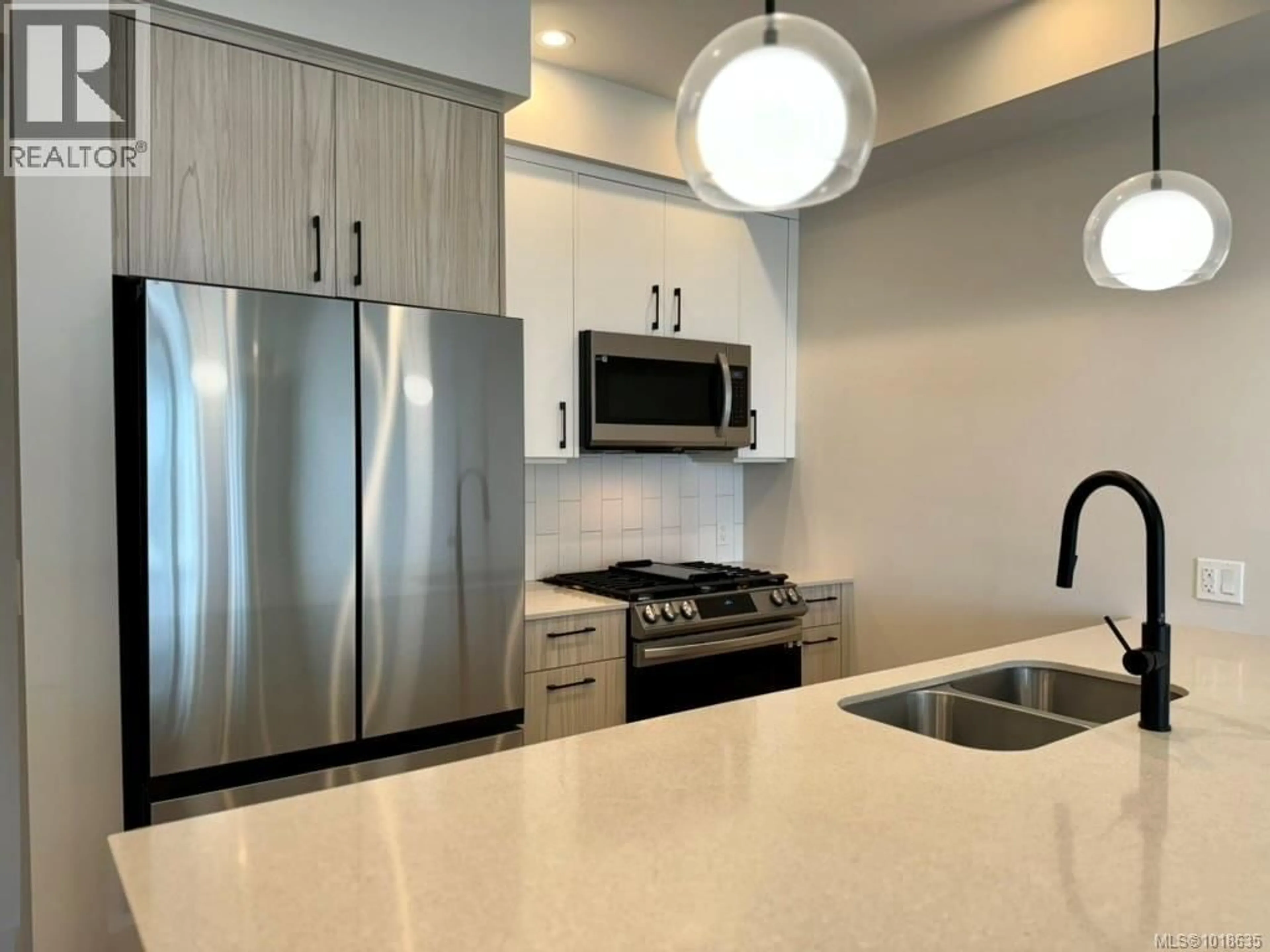 Open concept kitchen, unknown for 505 - 947 WHIRLAWAY CRESCENT, Langford British Columbia V9B6Z9