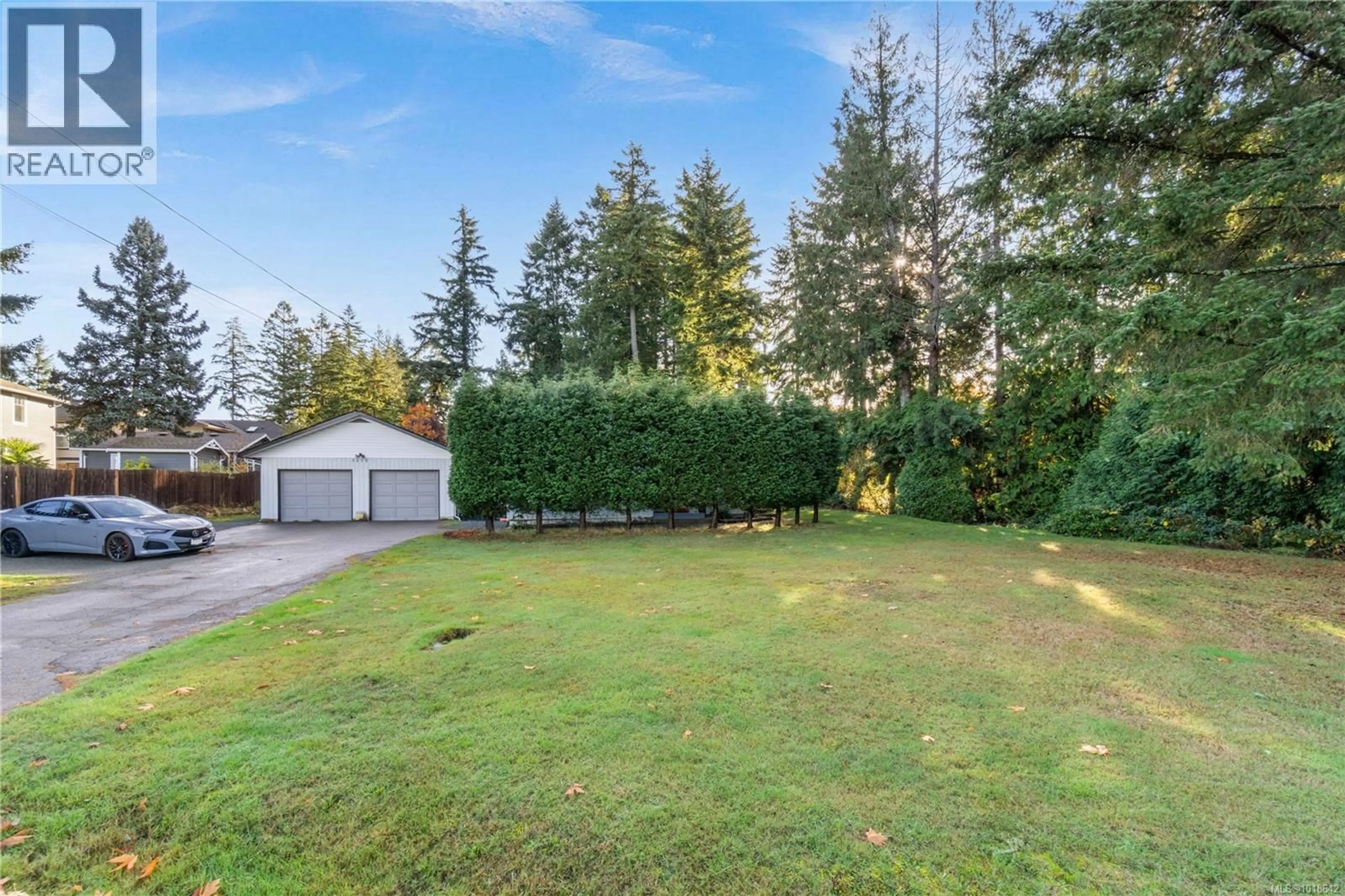 A pic from outside/outdoor area/front of a property/back of a property/a pic from drone, forest/trees view for 5378 RUTHERFORD ROAD, Nanaimo British Columbia V9T5N9