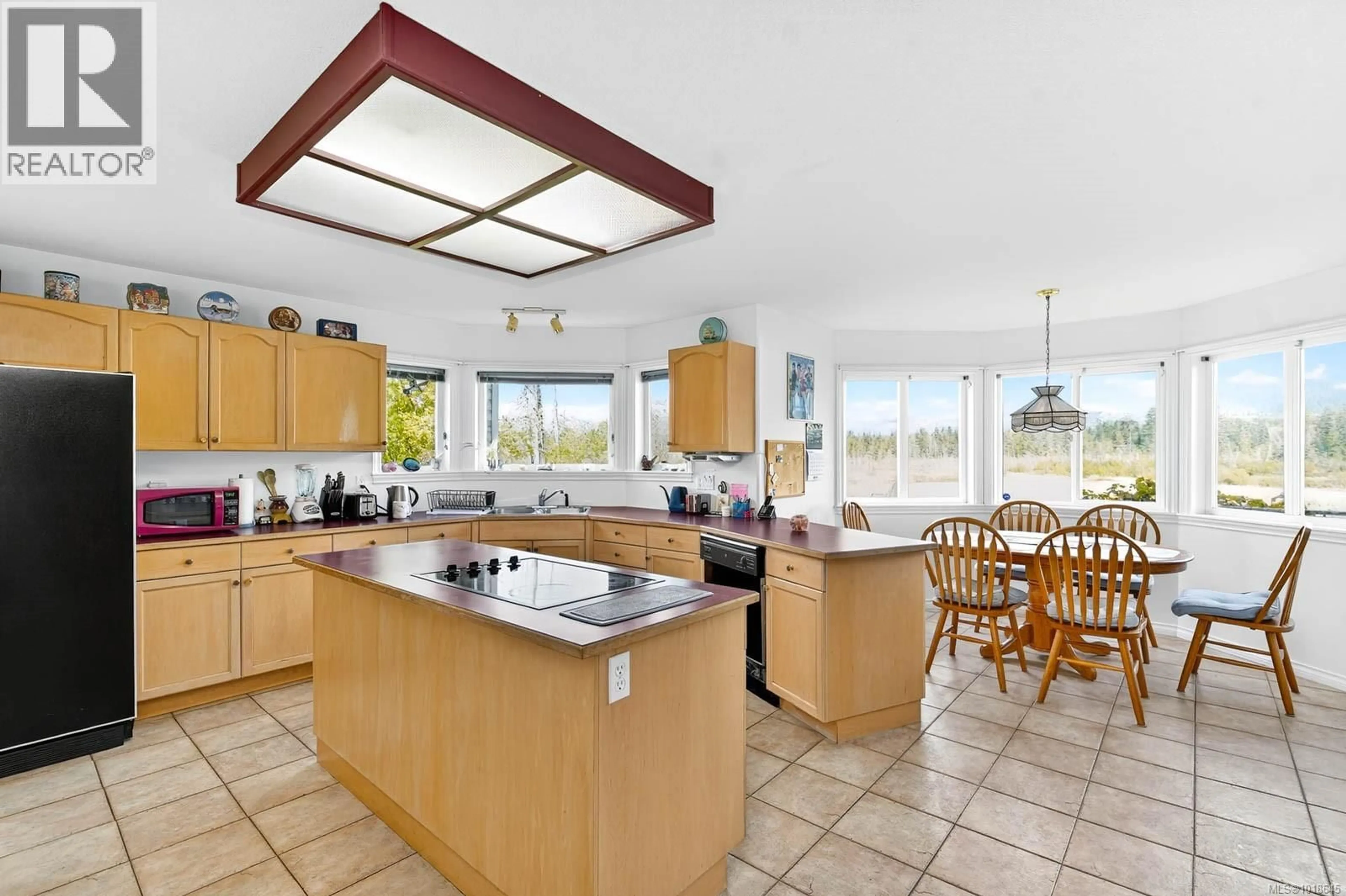 Open concept kitchen, ceramic/tile floor for 7799A BEAVER CREEK ROAD, Port Alberni British Columbia V9Y8M9