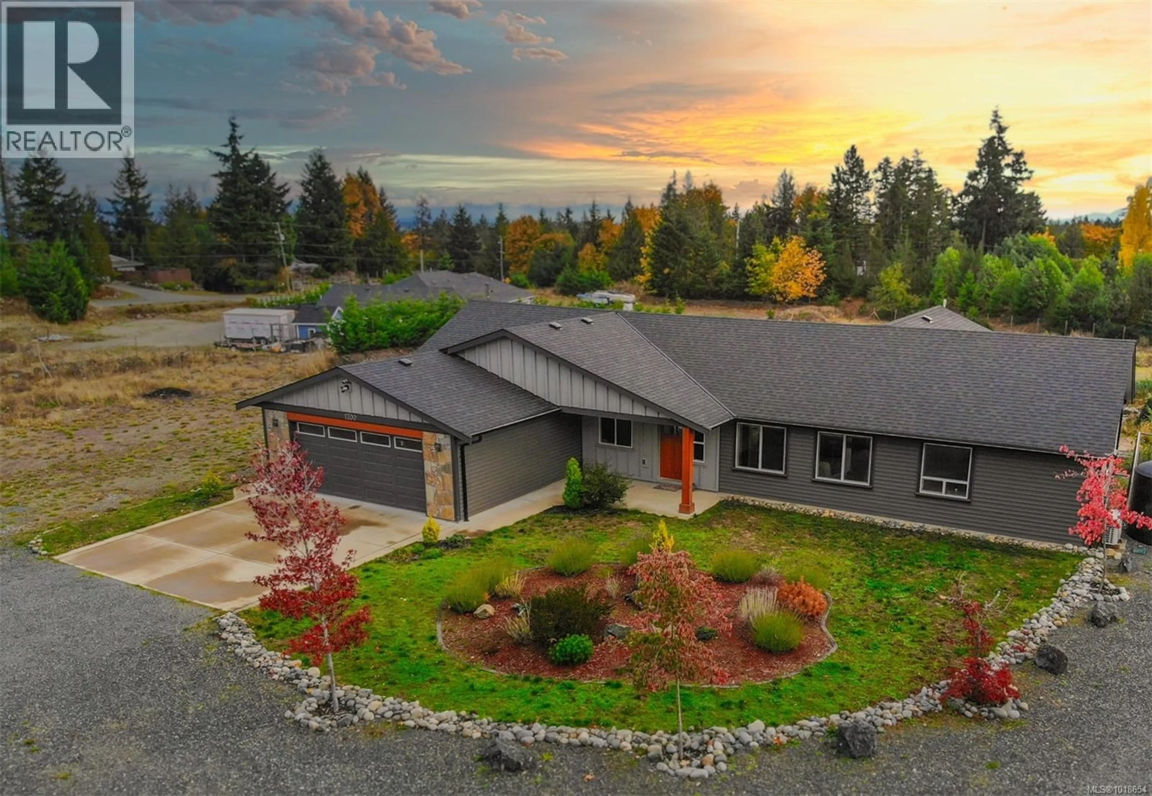 A pic from outside/outdoor area/front of a property/back of a property/a pic from drone, mountain view for 1700 WARN WAY, Qualicum Beach British Columbia V9K2S3