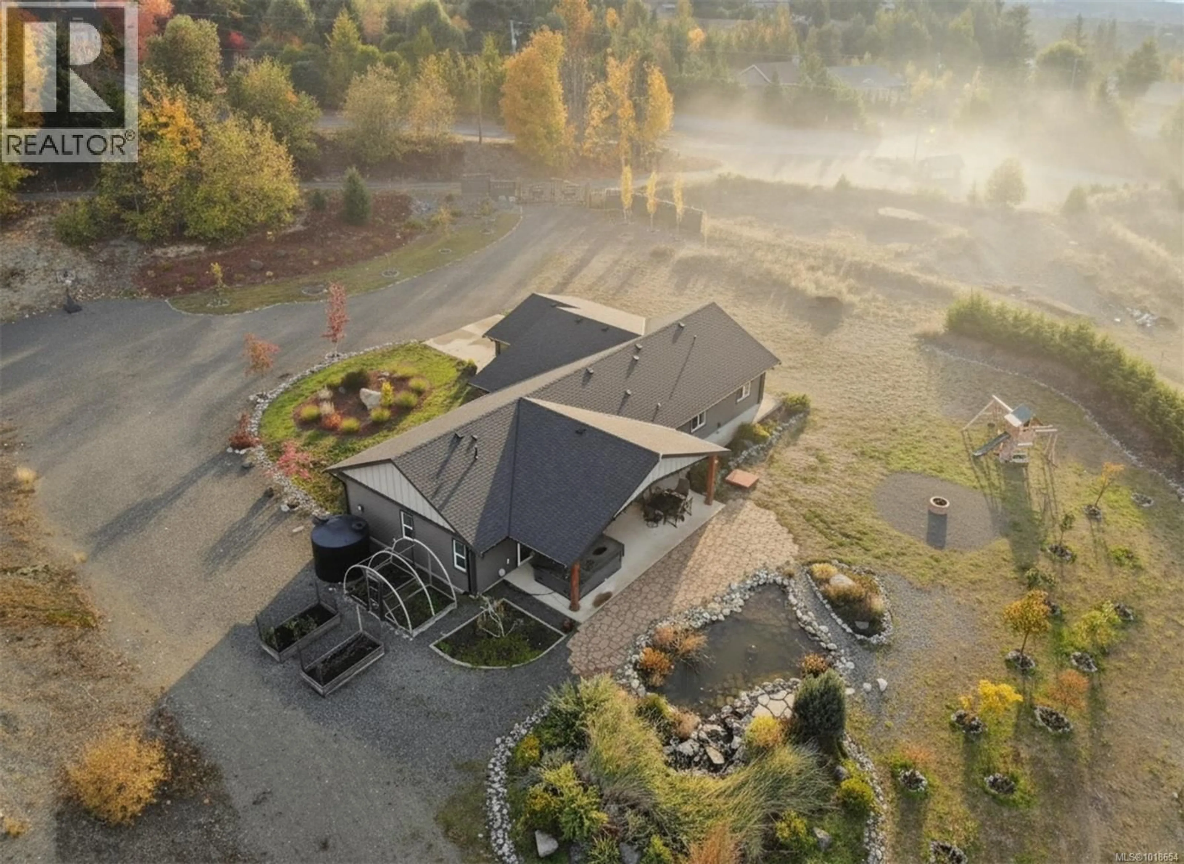A pic from outside/outdoor area/front of a property/back of a property/a pic from drone, mountain view for 1700 WARN WAY, Qualicum Beach British Columbia V9K2S3