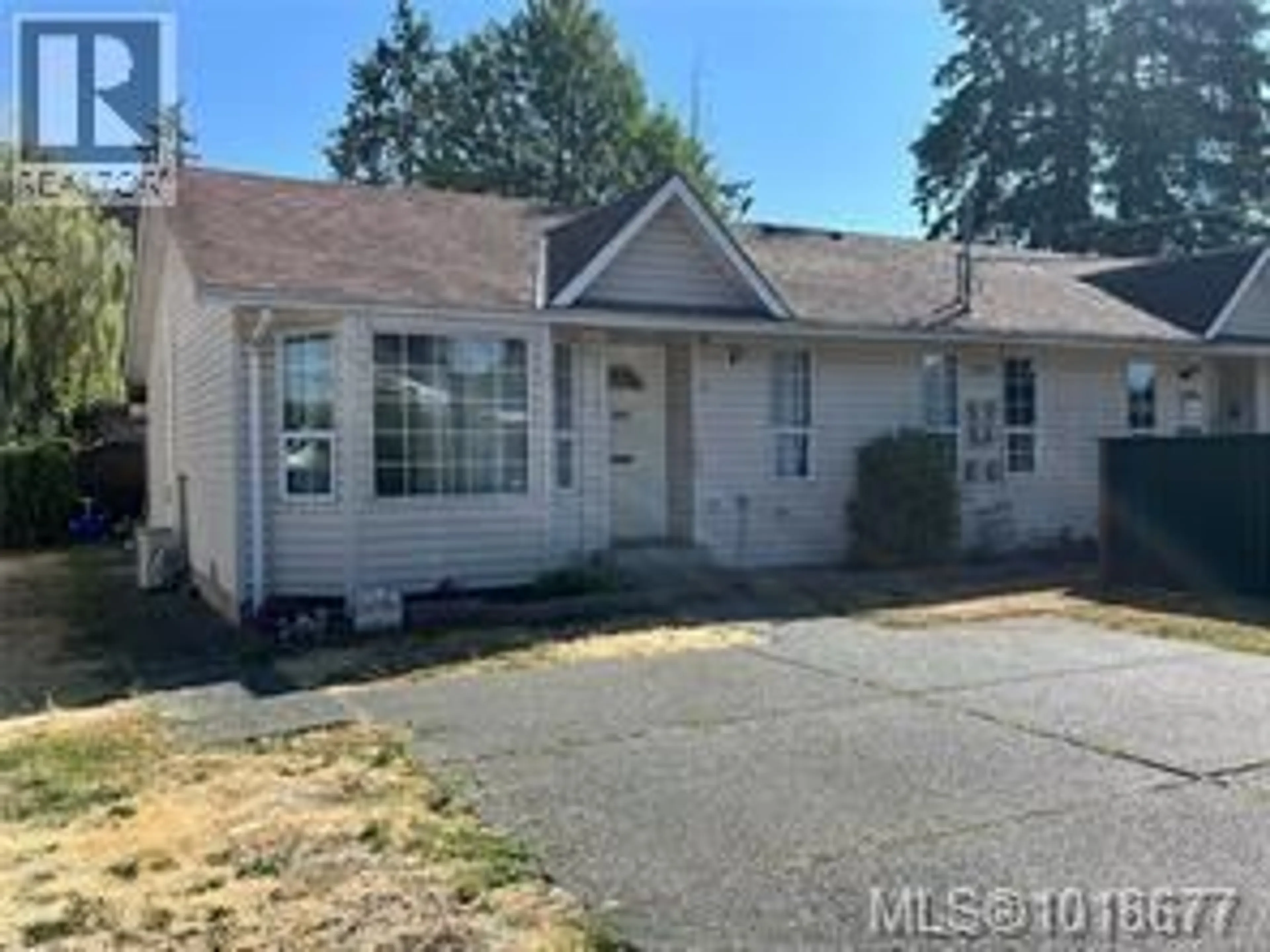 Home with vinyl exterior material, street for A - 1250 STEWART AVENUE, Courtenay British Columbia V9N3H4