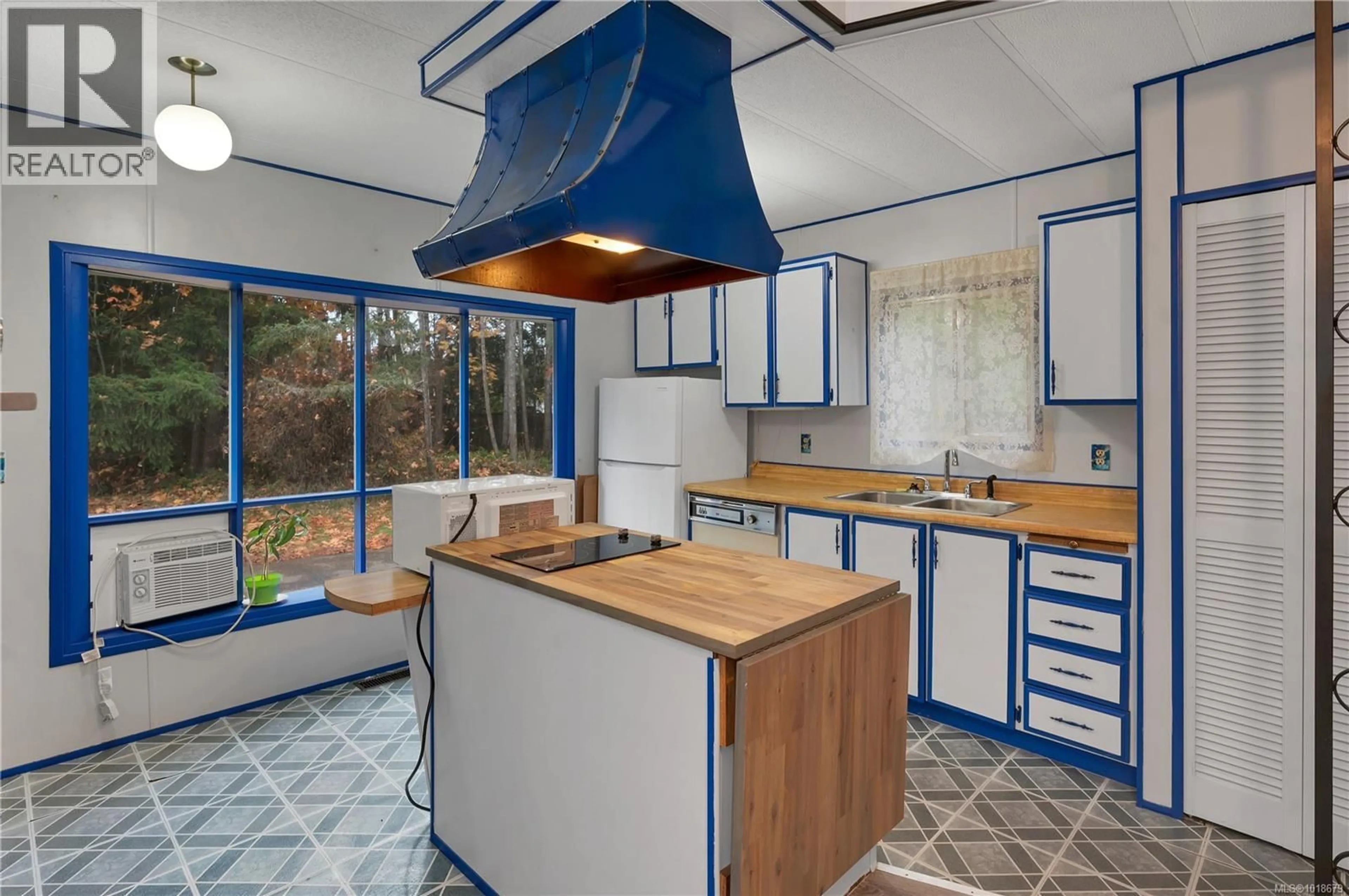 Standard kitchen, ceramic/tile floor for 8B - 2157 REGENT ROAD, Black Creek British Columbia V9J1K6