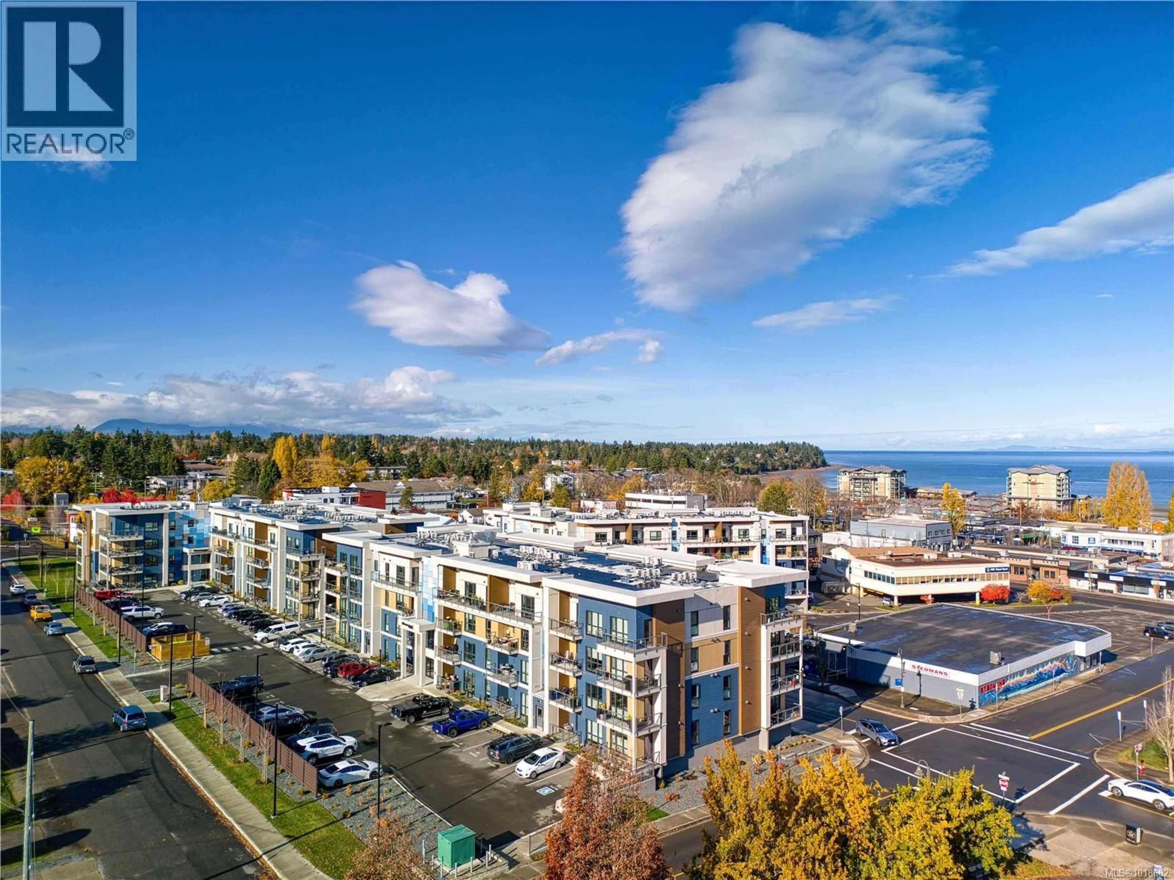 A pic from outside/outdoor area/front of a property/back of a property/a pic from drone, unknown for 209 - 120 JENSEN AVENUE WEST, Parksville British Columbia V9P0H6