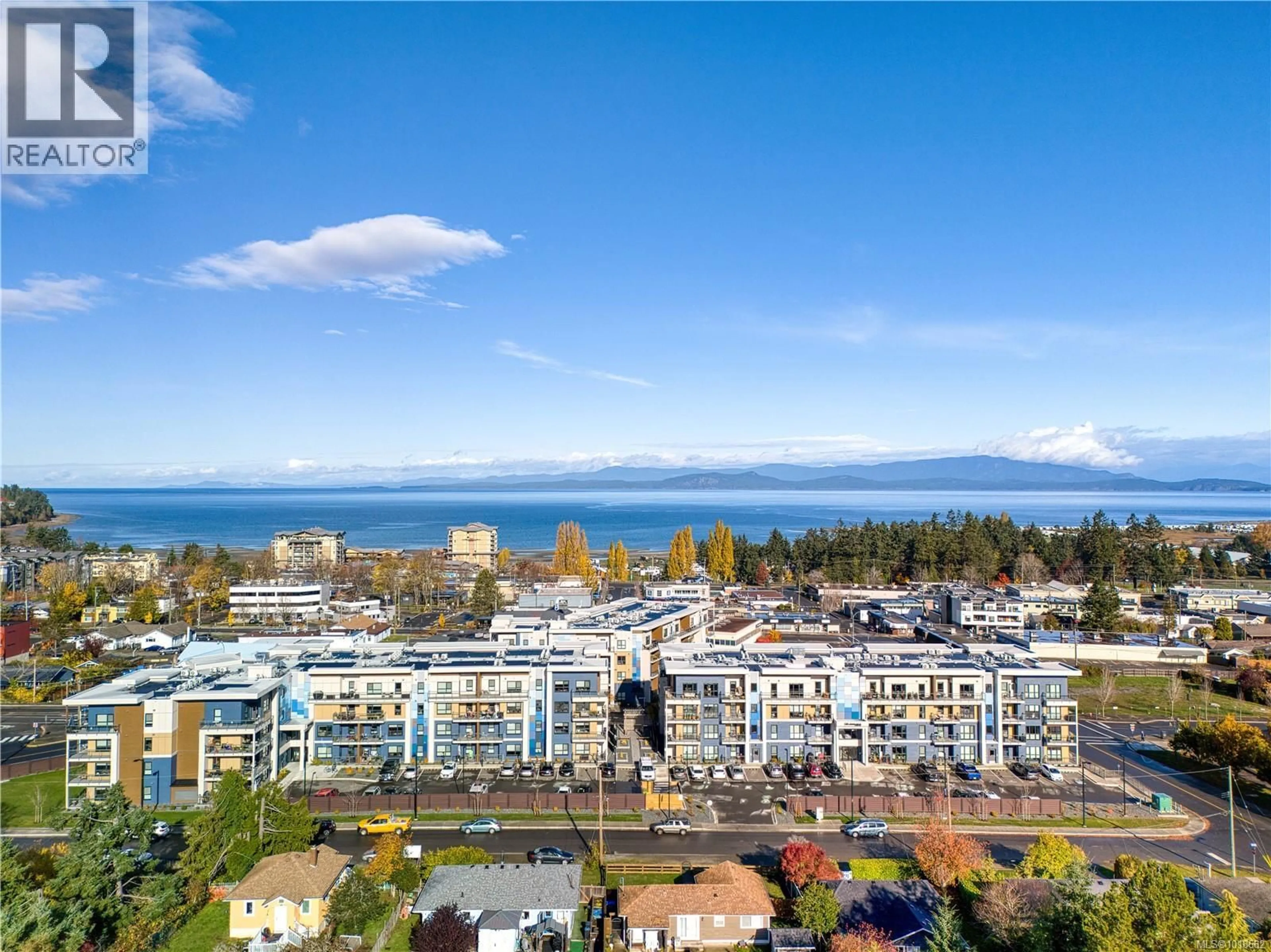 A pic from outside/outdoor area/front of a property/back of a property/a pic from drone, water/lake/river/ocean view for 209 - 120 JENSEN AVENUE WEST, Parksville British Columbia V9P0H6