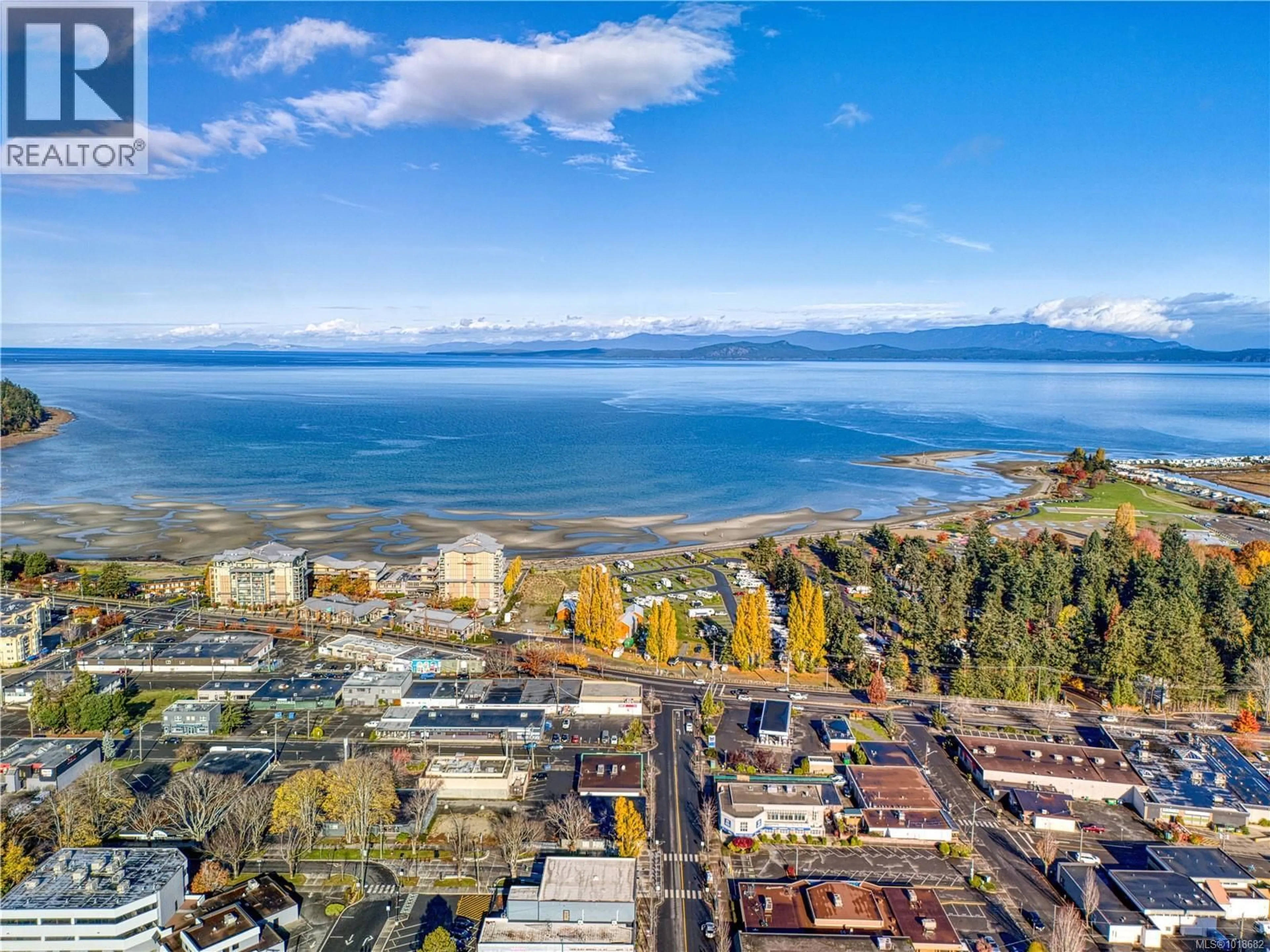 A pic from outside/outdoor area/front of a property/back of a property/a pic from drone, water/lake/river/ocean view for 209 - 120 JENSEN AVENUE WEST, Parksville British Columbia V9P0H6