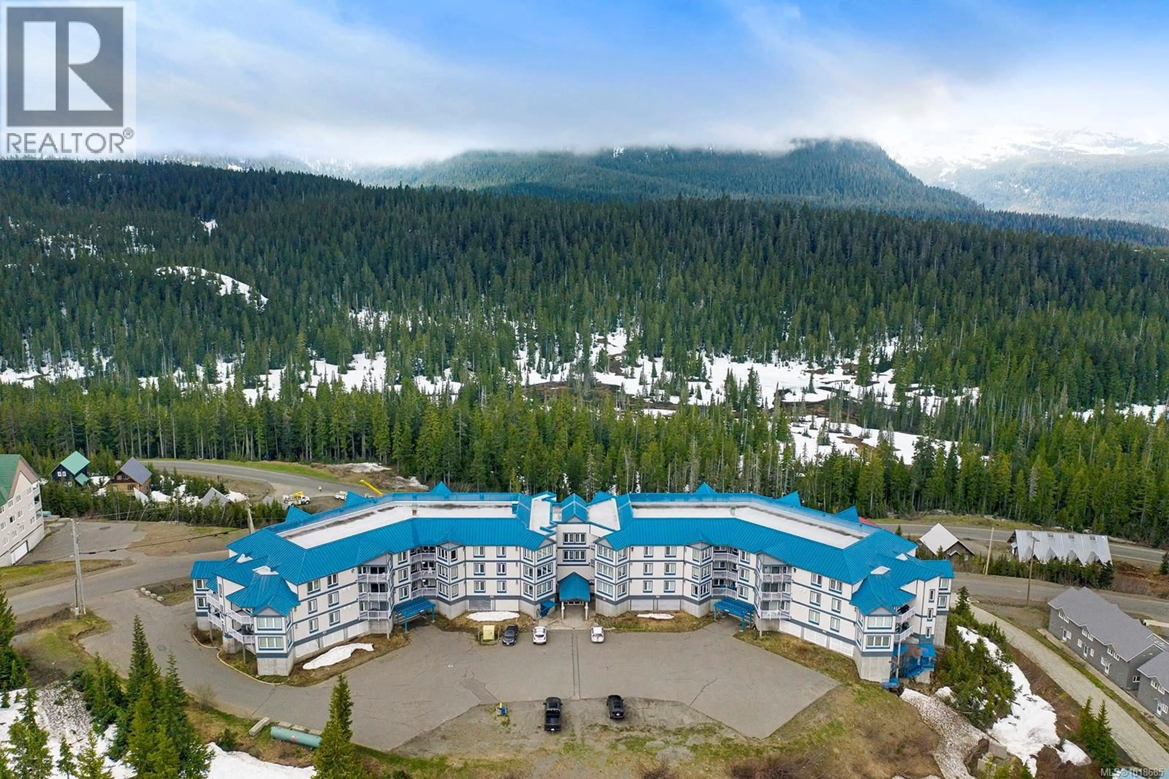 A pic from outside/outdoor area/front of a property/back of a property/a pic from drone, mountain view for 106 - 1320 HENRY ROAD, Courtenay British Columbia V9J1L0