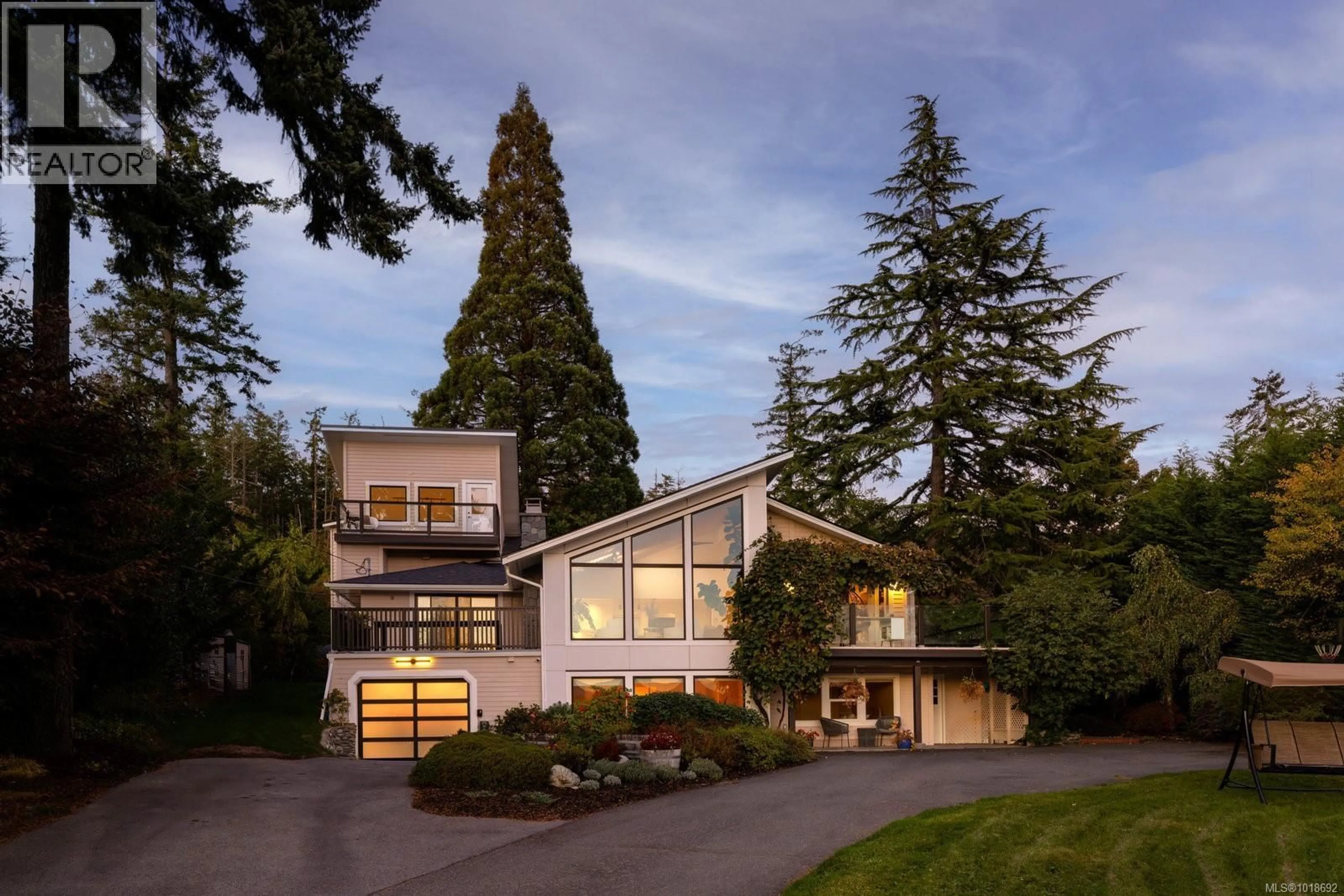 Home with vinyl exterior material, street for 11321 CHALET ROAD, North Saanich British Columbia V8L5M1