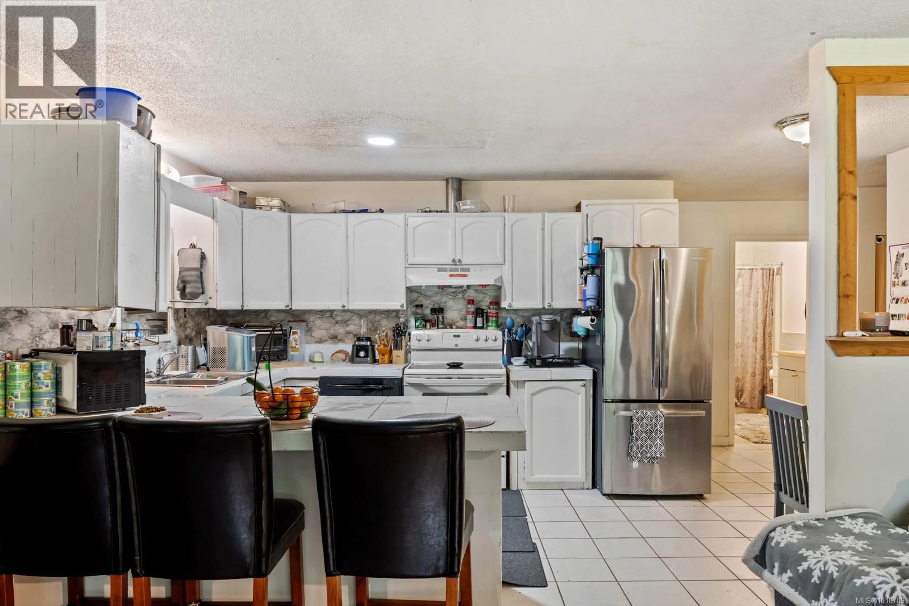 Open concept kitchen, ceramic/tile floor for 4792 LEWIS ROAD, Campbell River British Columbia V9H1C4