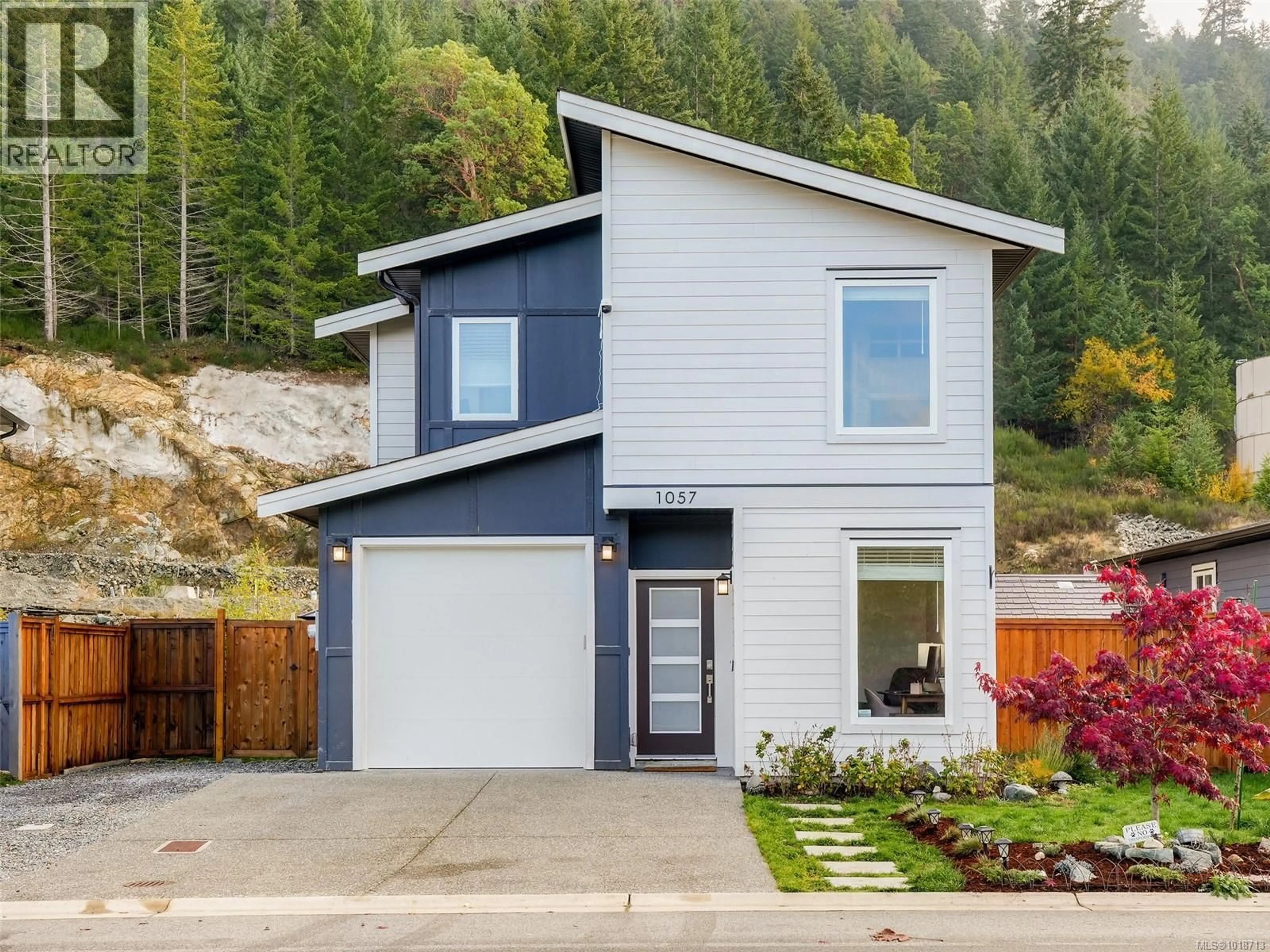 Home with vinyl exterior material, street for 1057 GAMMON WAY, Shawnigan Lake British Columbia V8H2J2