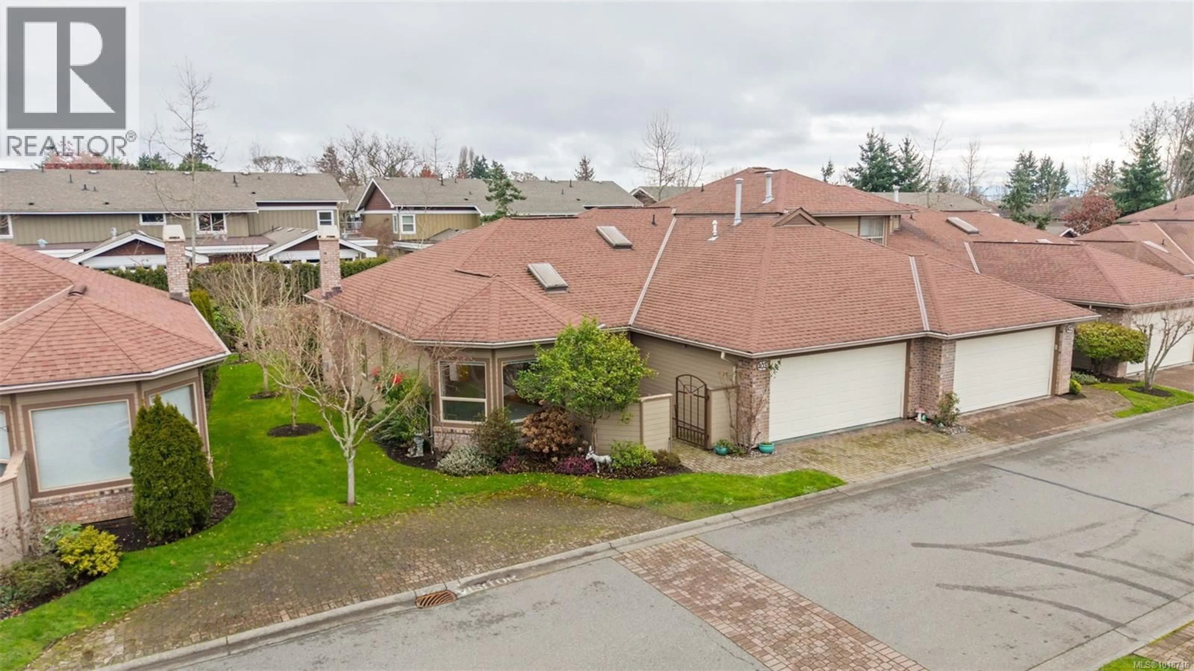A pic from outside/outdoor area/front of a property/back of a property/a pic from drone, street for 403 - 4515 PIPELINE ROAD, Saanich British Columbia V8Z5M3
