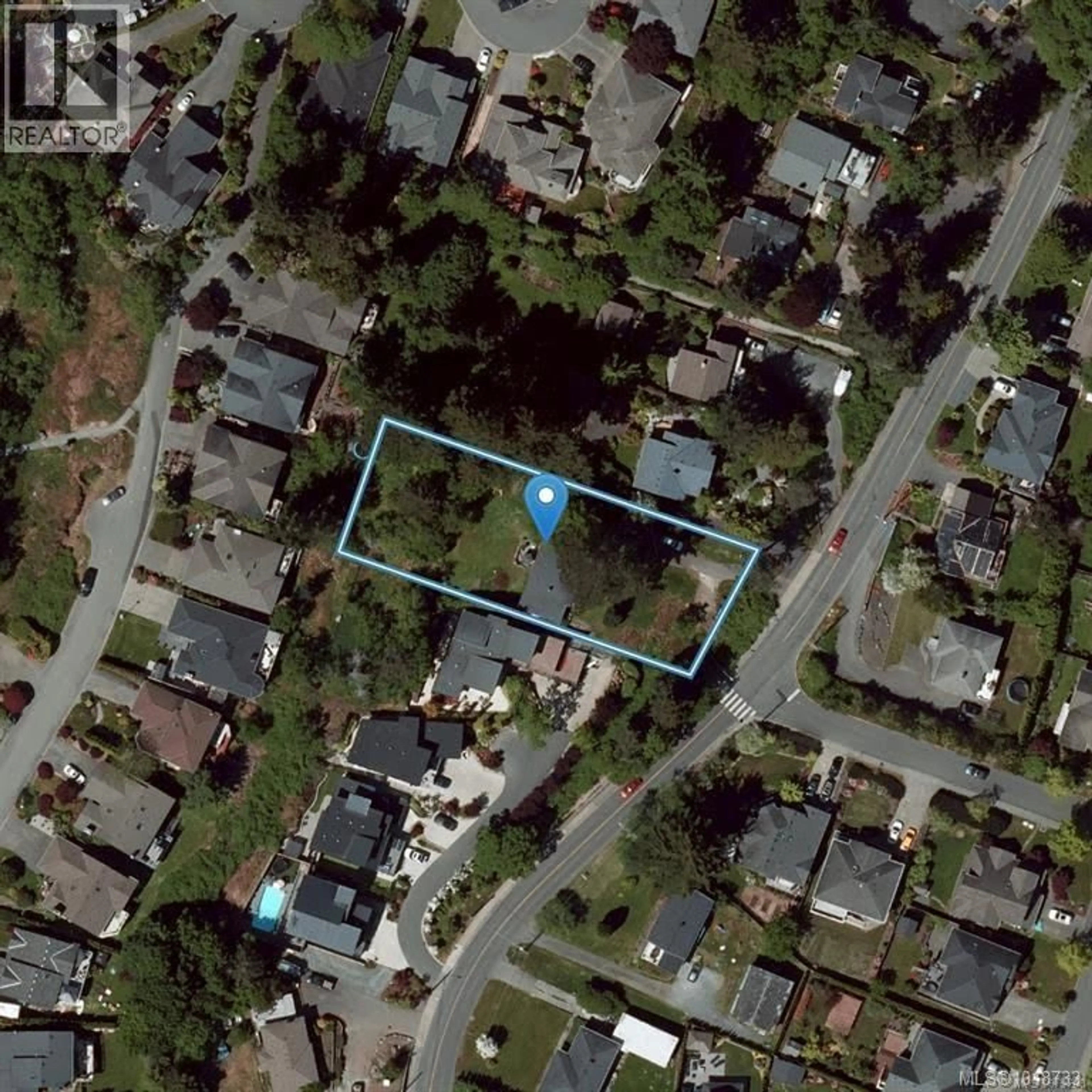 A pic from outside/outdoor area/front of a property/back of a property/a pic from drone, street for 3904 WILKINSON ROAD, Saanich British Columbia V8Z5A2
